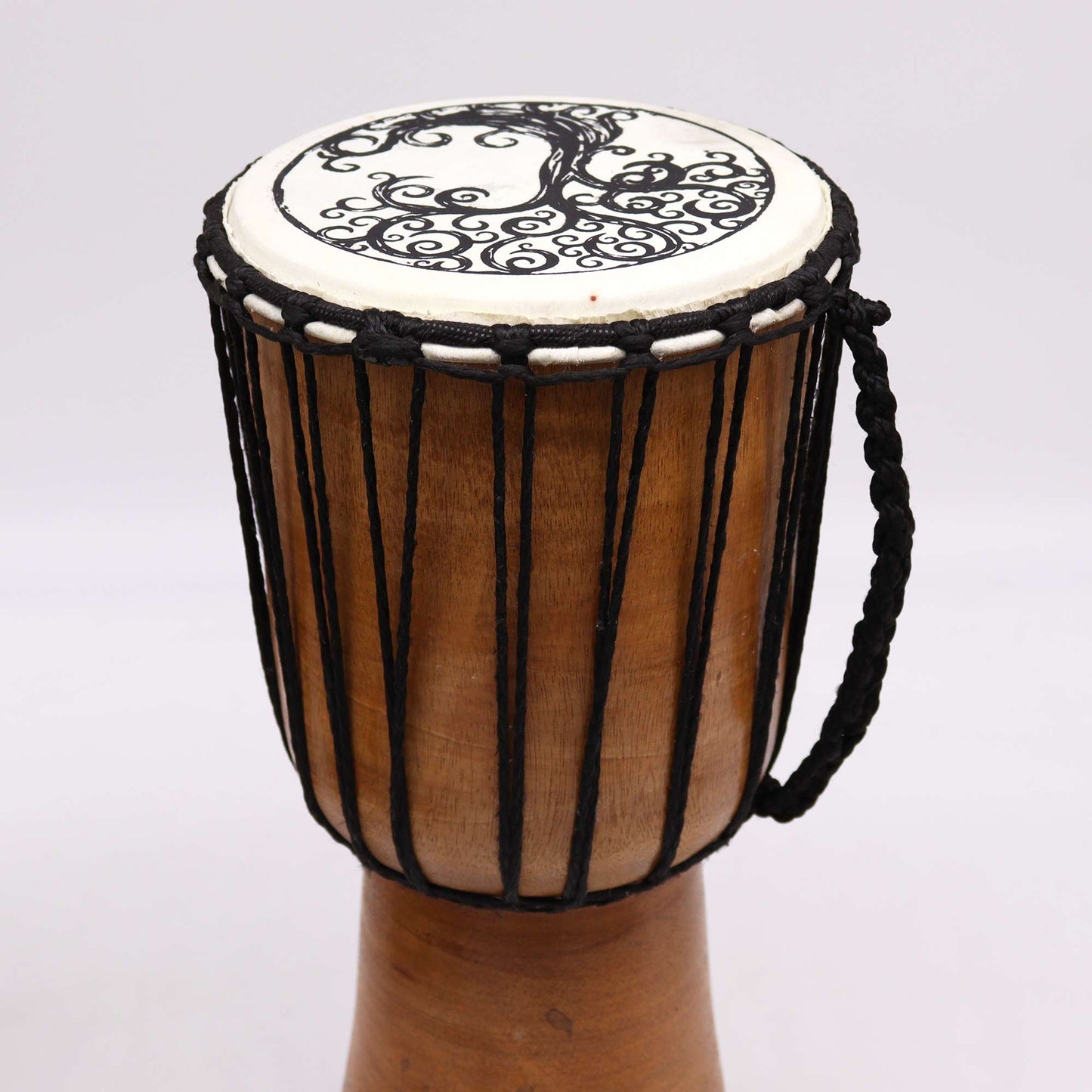 18cm Wide Top Djembe Drum - Tree of Life product packaging on clean background from Quintessential Holistic Health Ltd