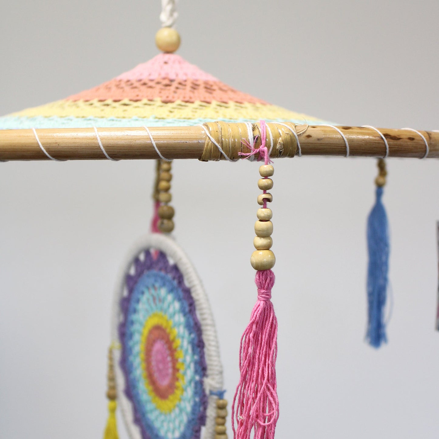 Handcrafted Rainbow Dreamcatcher - Extra Large / Tiered / Pastel Colours product packaging on clean background from Quintessential Holistic Health Ltd