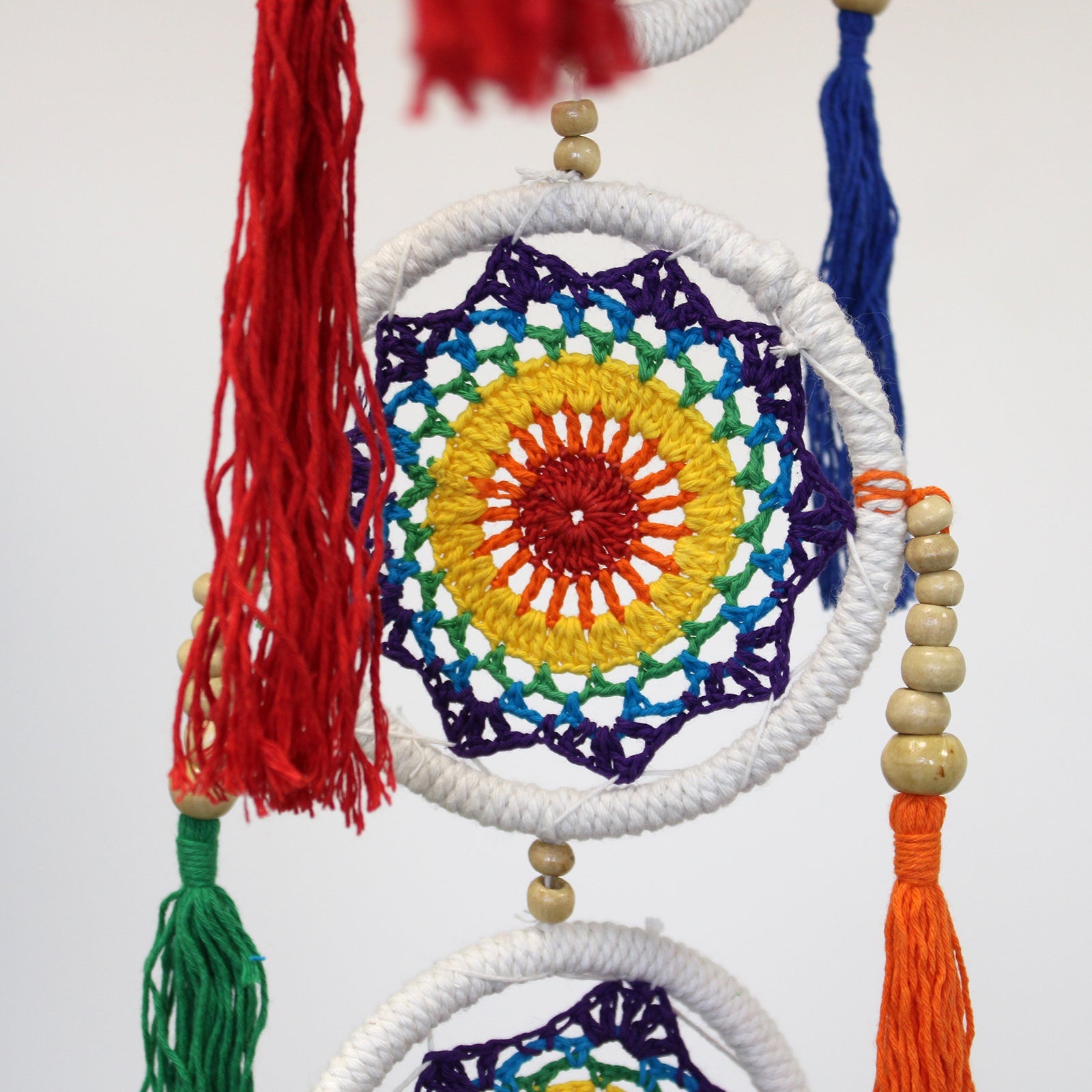 Handcrafted Rainbow Dreamcatcher - Large / Tiered / Vivid Colours product packaging on clean background from Quintessential Holistic Health Ltd
