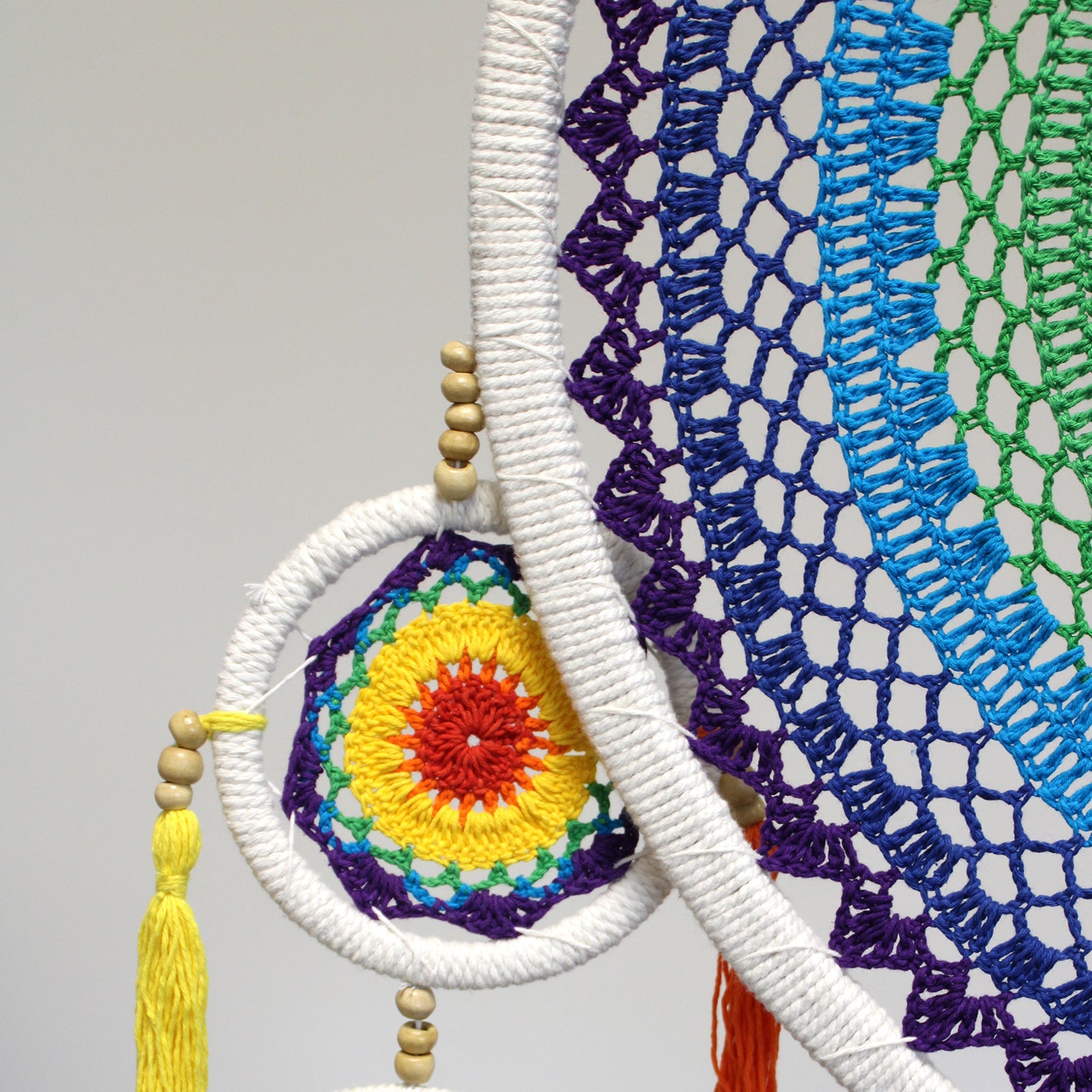 Handcrafted Rainbow Dreamcatcher - Large / Round / Vivid Colours product packaging on clean background from Quintessential Holistic Health Ltd
