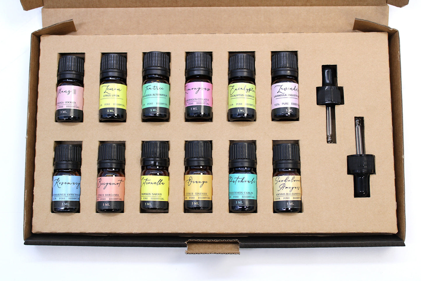 Vegan 100% Pure Aromatherapy Essential Oil Set - Top 12, overhead view of an open box with twelve bottles and two droppers at right by Quintessential Holistic Health Ltd