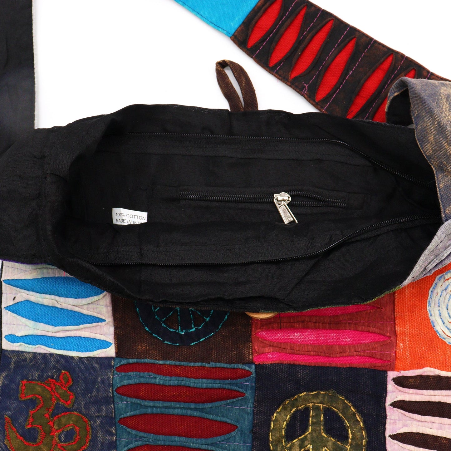 Handmade Indian Sling Bag - Peace product packaging on clean background from Quintessential Holistic Health Ltd