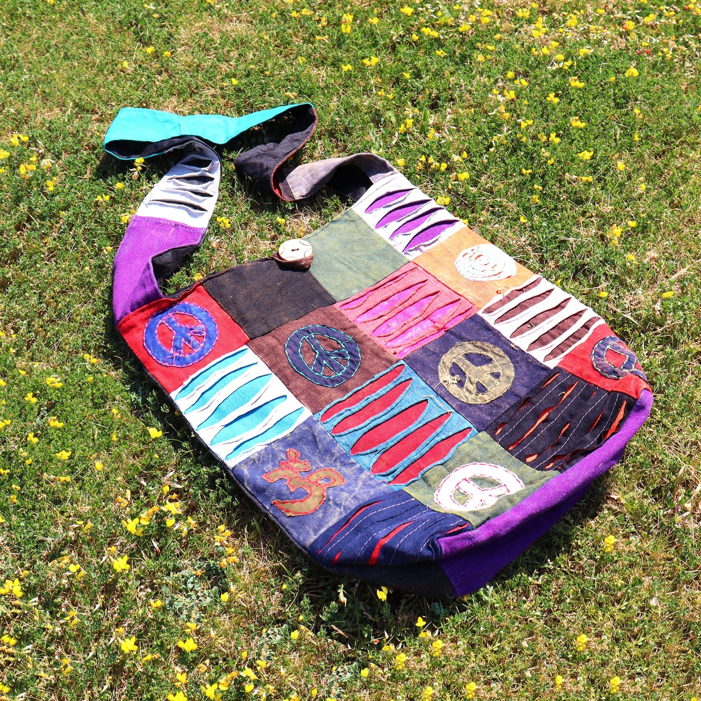 Handmade Indian Sling Bag - Peace product packaging on clean background from Quintessential Holistic Health Ltd