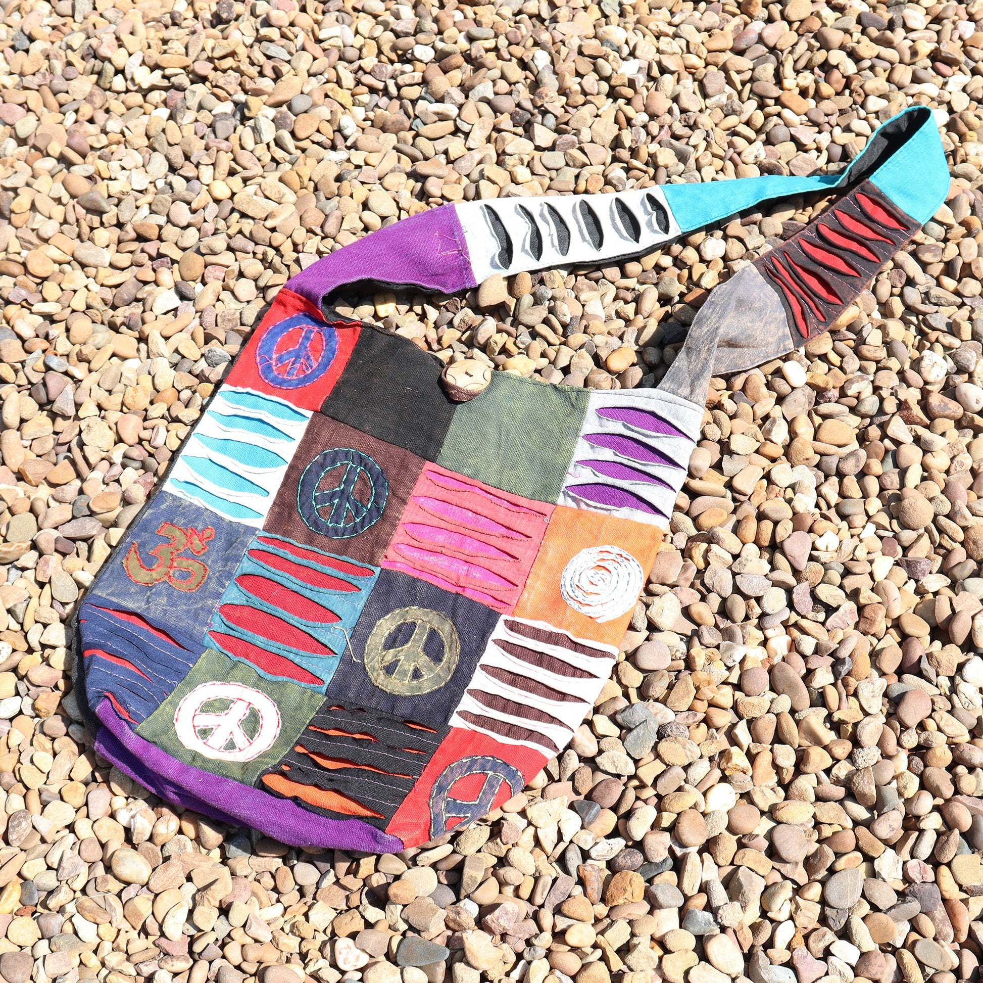 Handmade Indian Sling Bag - Peace product packaging on clean background from Quintessential Holistic Health Ltd
