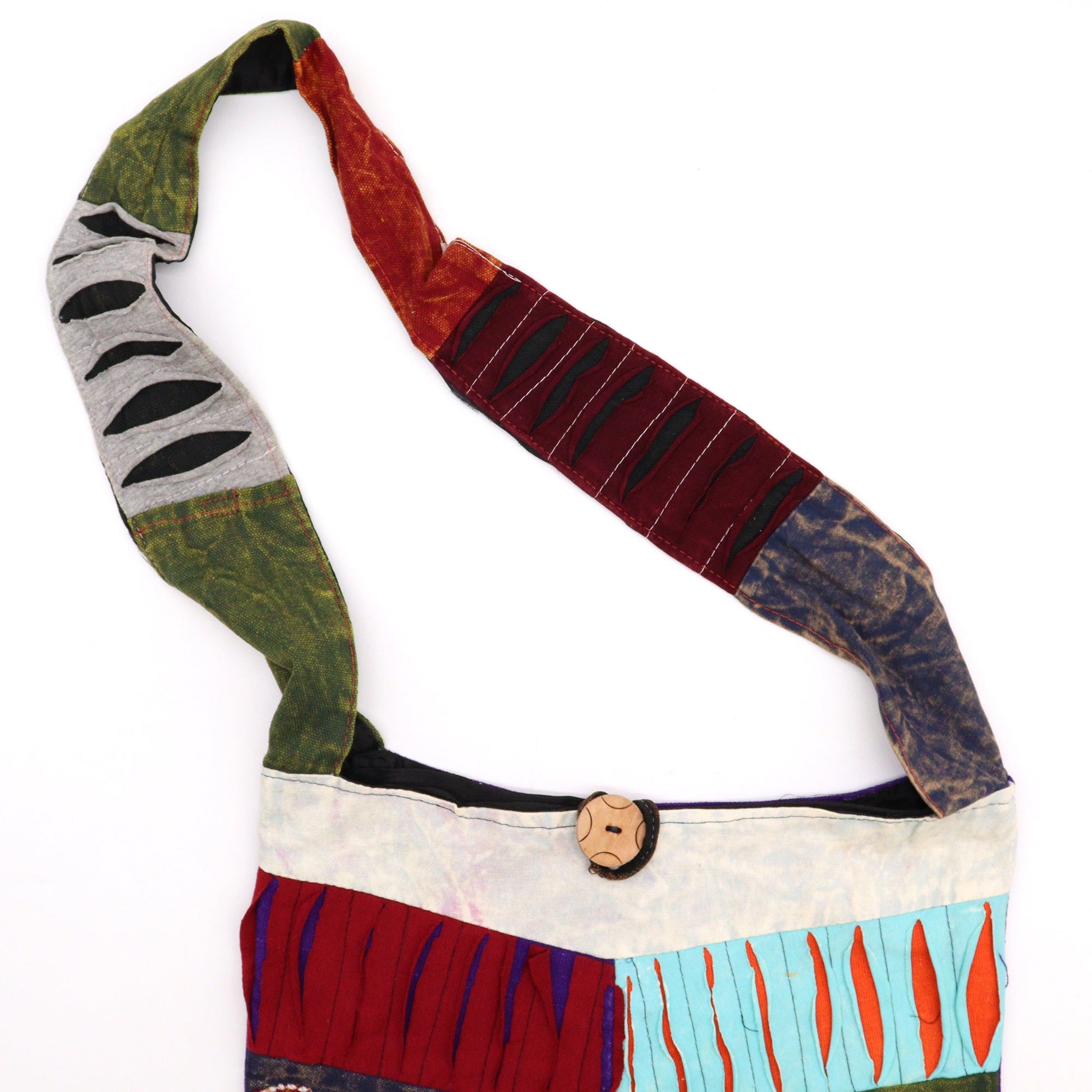 Handmade Indian Sling Bag - Peace and Love product packaging on clean background from Quintessential Holistic Health Ltd