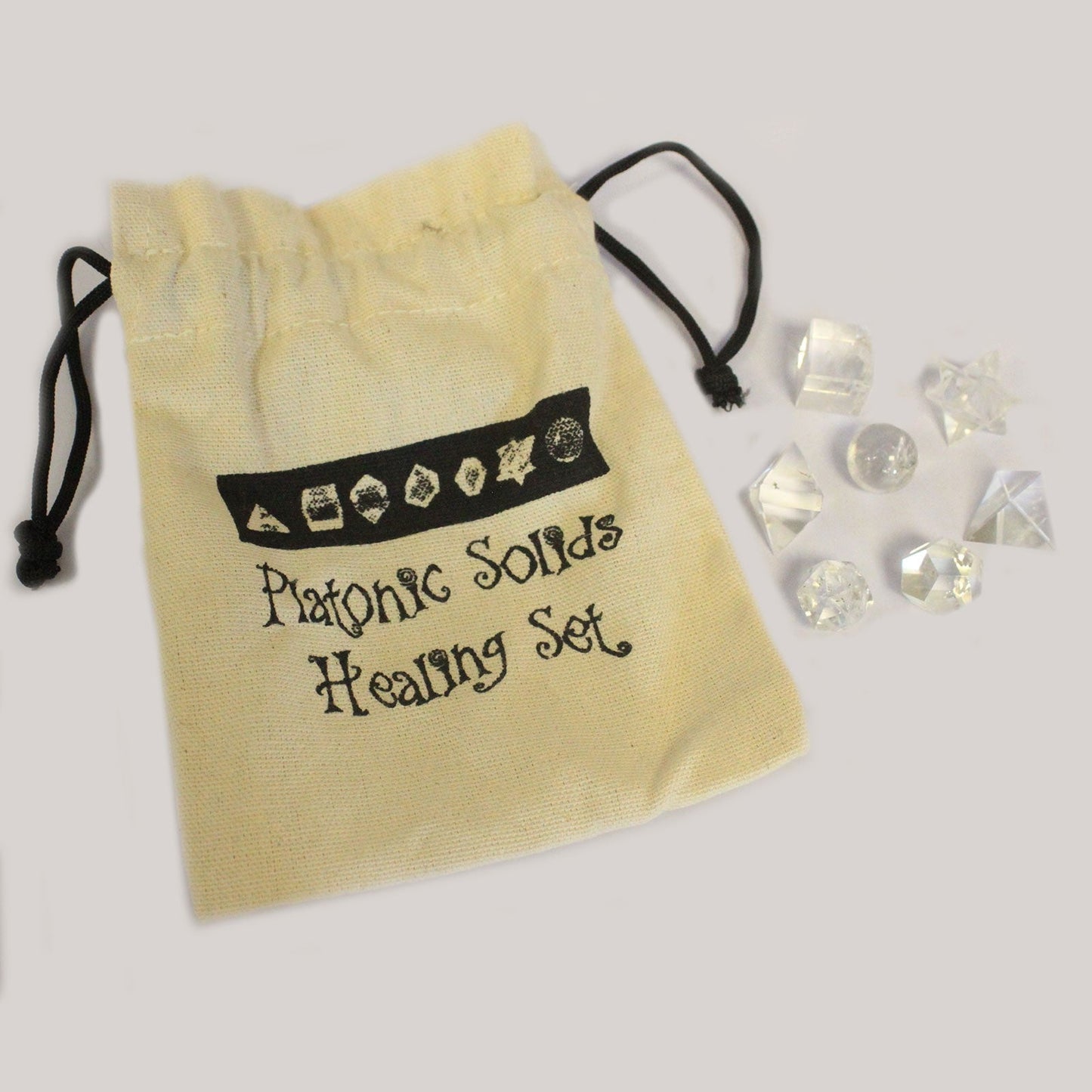 Geometric Seven Piece Crystal Set product packaging on clean background from Quintessential Holistic Health Ltd