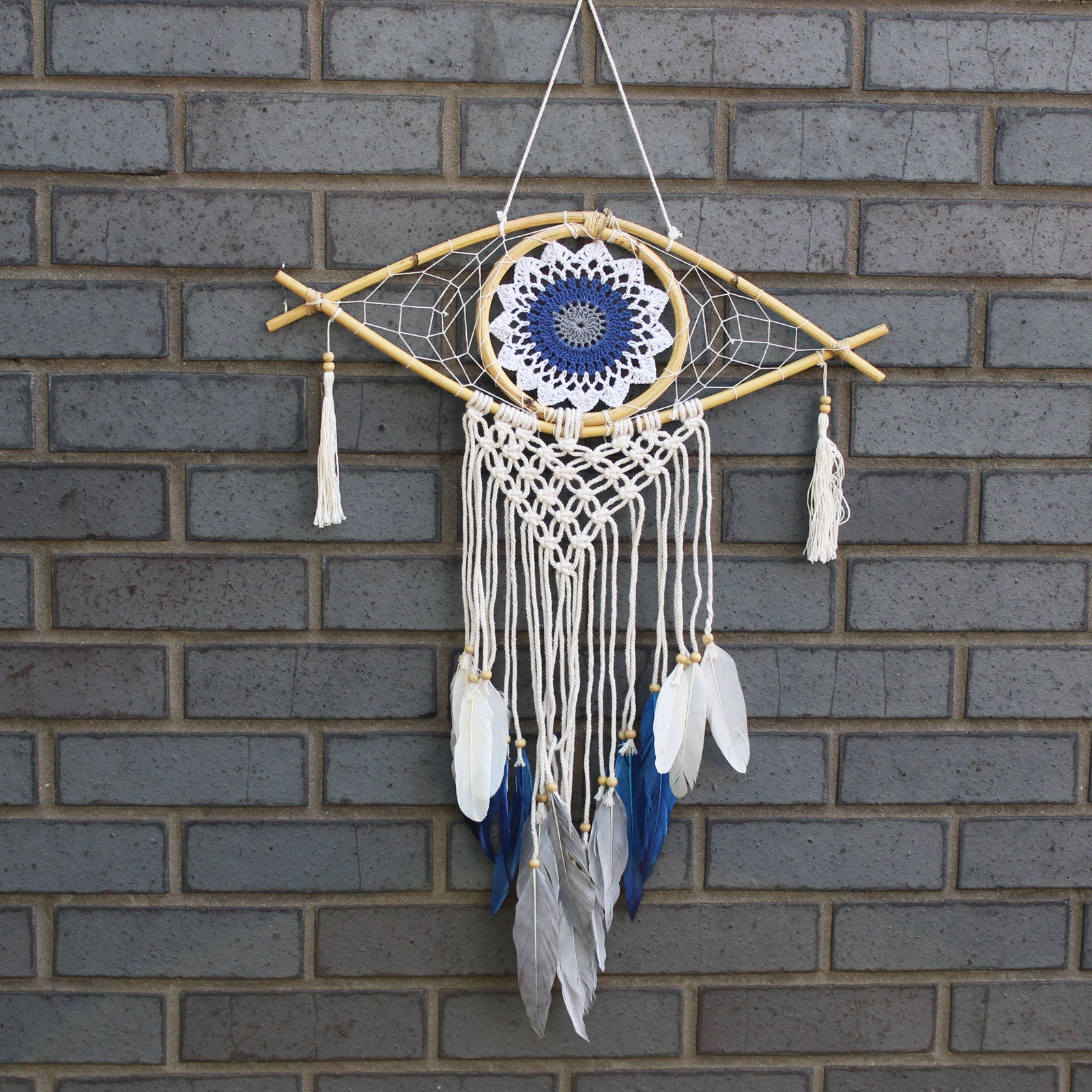 Handcrafted Macrame and Rattan Protection Dreamcatcher - Medium / Evil Eye / White, Blue and Grey product packaging on clean background from Quintessential Holistic Health Ltd