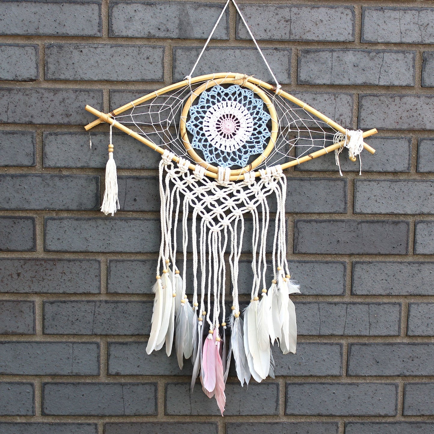 Handcrafted Macrame and Rattan Protection Dreamcatcher - Medium / Evil Eye / Blue, White and Pink product packaging on clean background from Quintessential Holistic Health Ltd