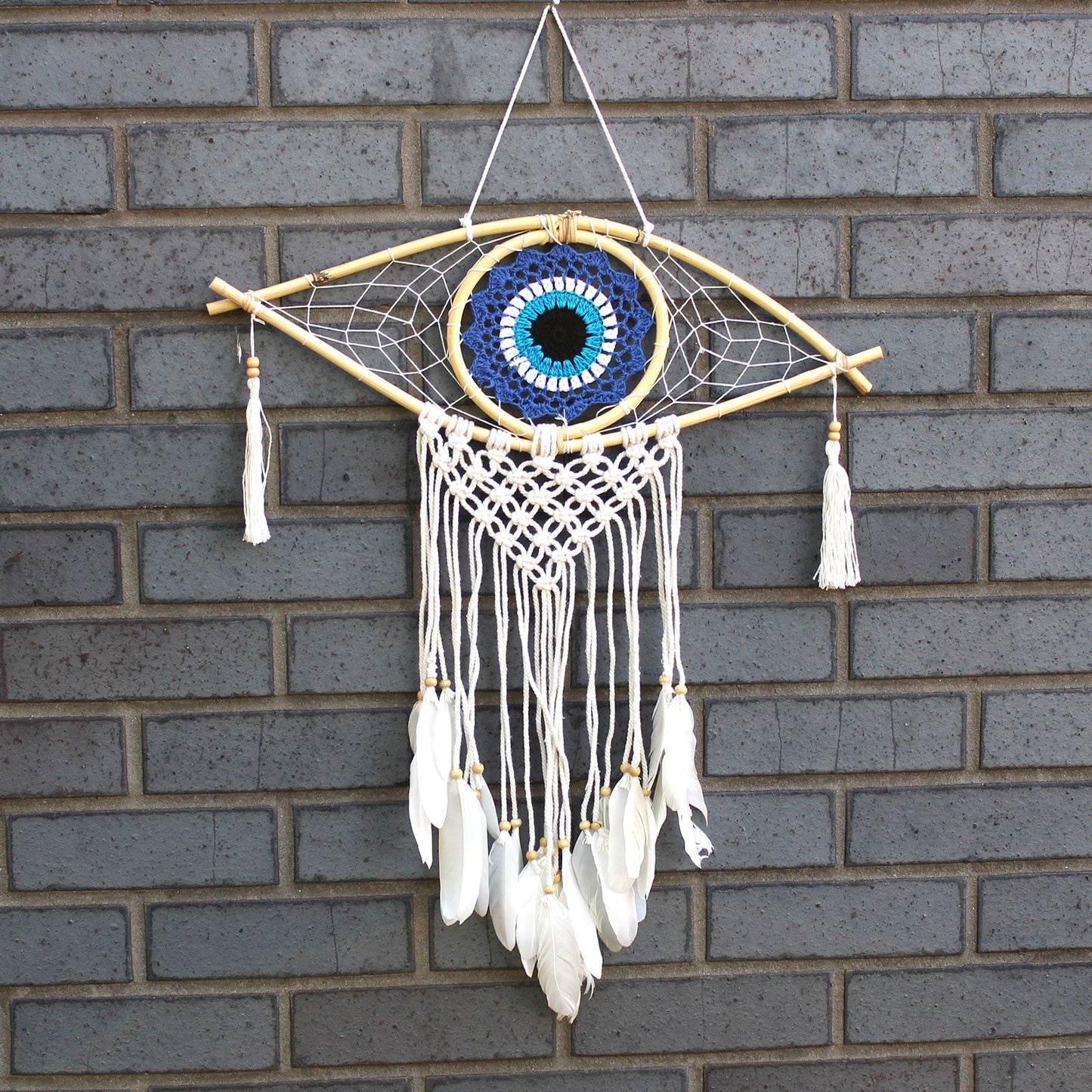 Handcrafted Macrame and Rattan Protection Dreamcatcher - Medium / Evil Eye / Blue, White and Black product packaging on clean background from Quintessential Holistic Health Ltd
