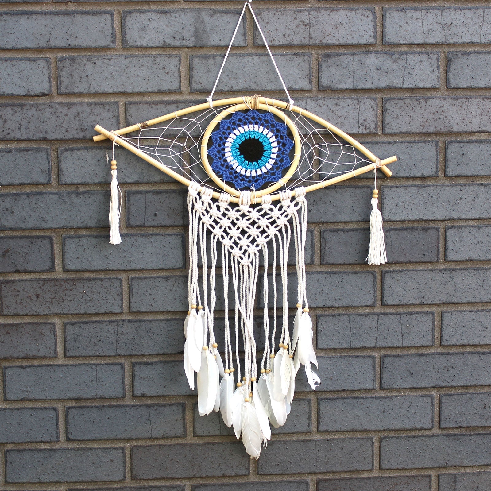 Handcrafted Macrame and Rattan Protection Dreamcatcher - Medium / Evil Eye / Blue, White and Black product packaging on clean background from Quintessential Holistic Health Ltd