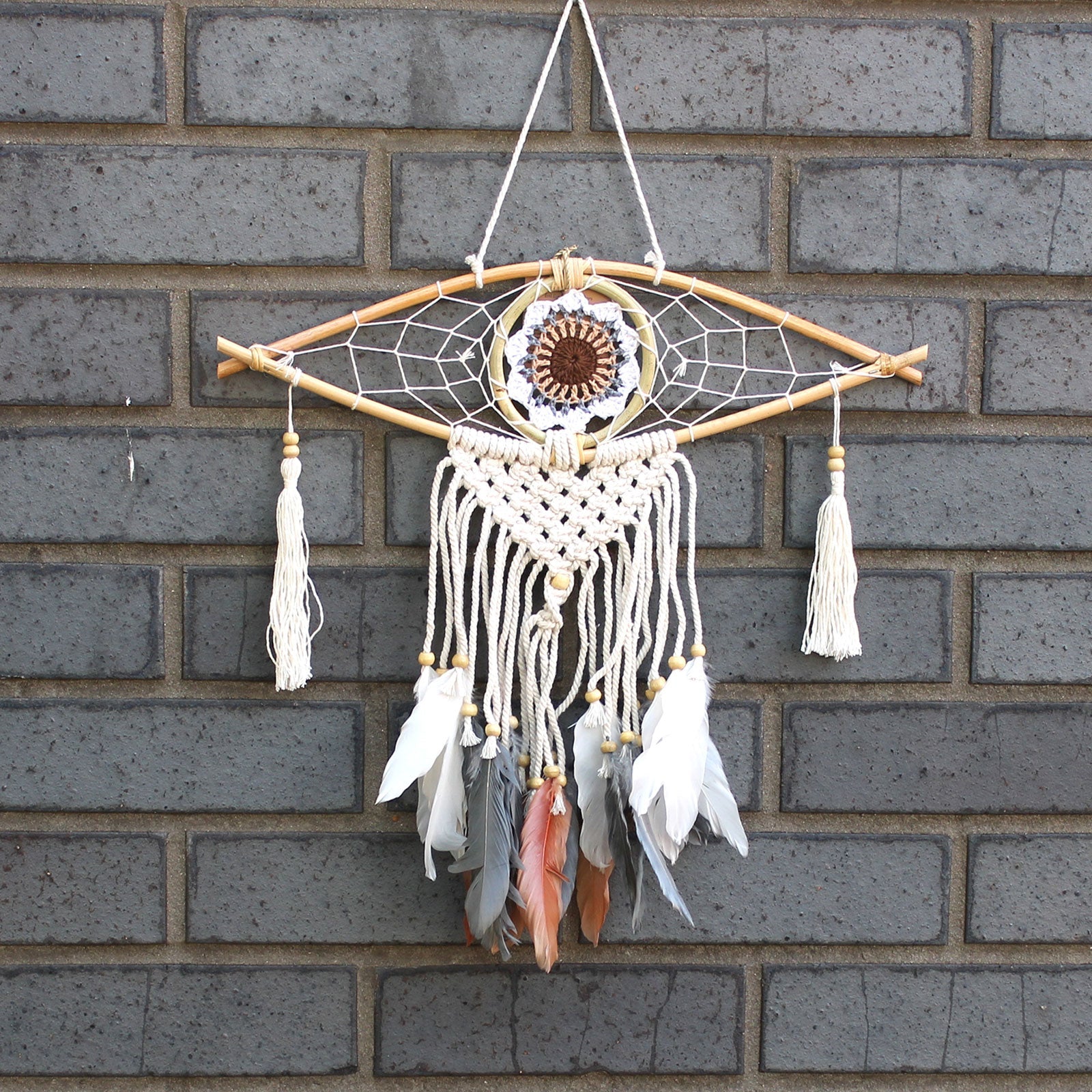 Handcrafted Macrame and Rattan Protection Dreamcatcher - Small / Evil Eye / Random Colours product packaging on clean background from Quintessential Holistic Health Ltd