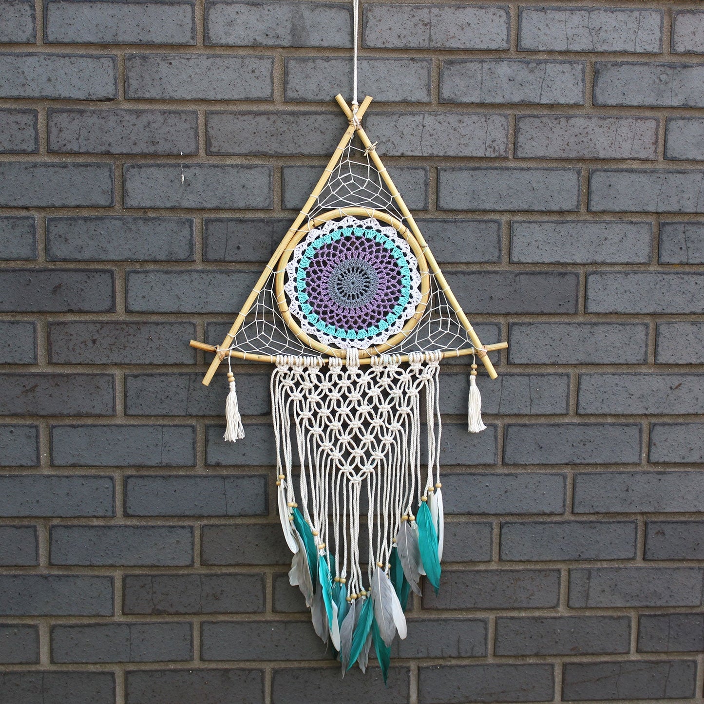 Handcrafted Macrame and Rattan Protection Dreamcatcher - Large / Pyramid / White and Turquoise product packaging on clean background from Quintessential Holistic Health Ltd
