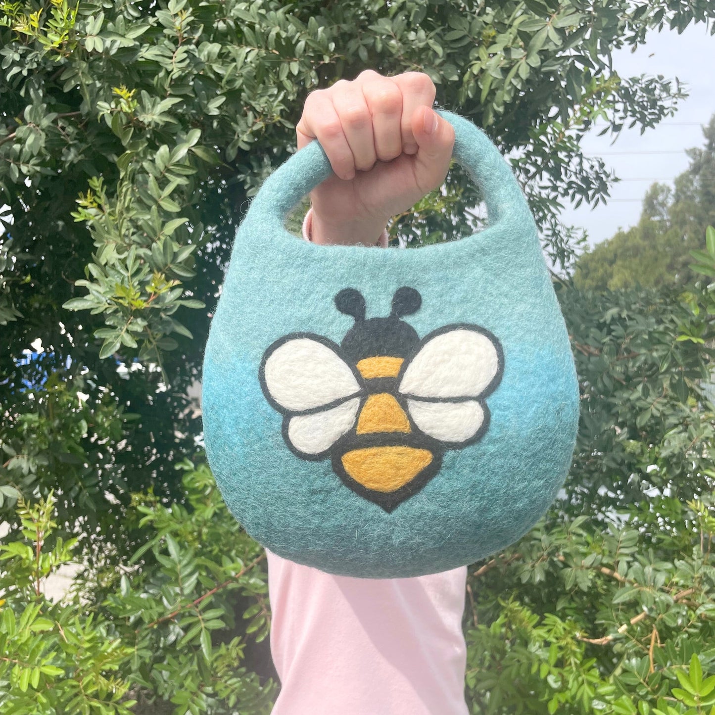 Handcrafted Wool Water Felted One Handle with Magnet Bag - Bee / Shades of Blues and Greens product packaging on clean background from Quintessential Holistic Health Ltd