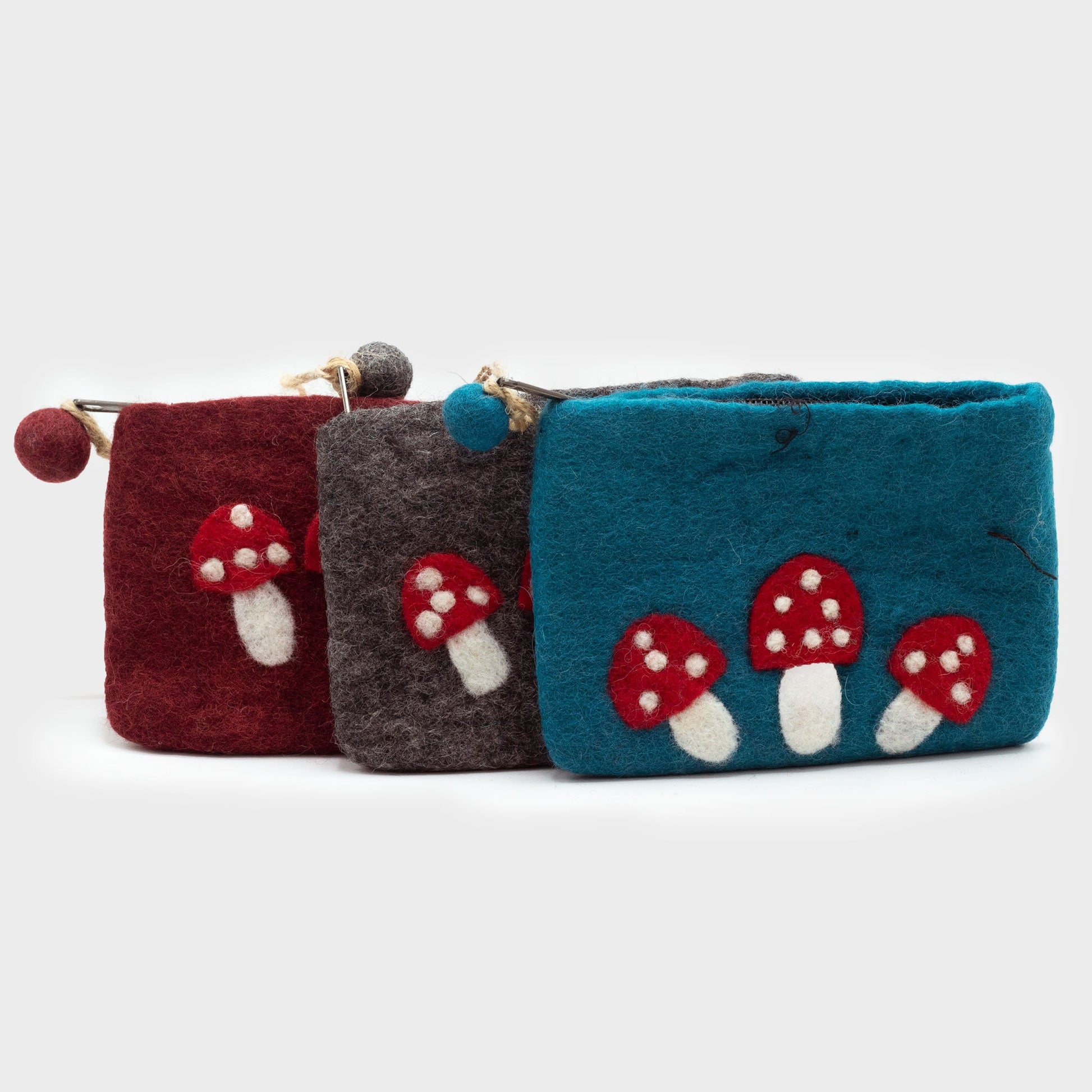 Handmade Natural Felt Purse or Pouch with Zip - Assorted Colours / Wild Mushrooms product packaging on clean background from Quintessential Holistic Health Ltd