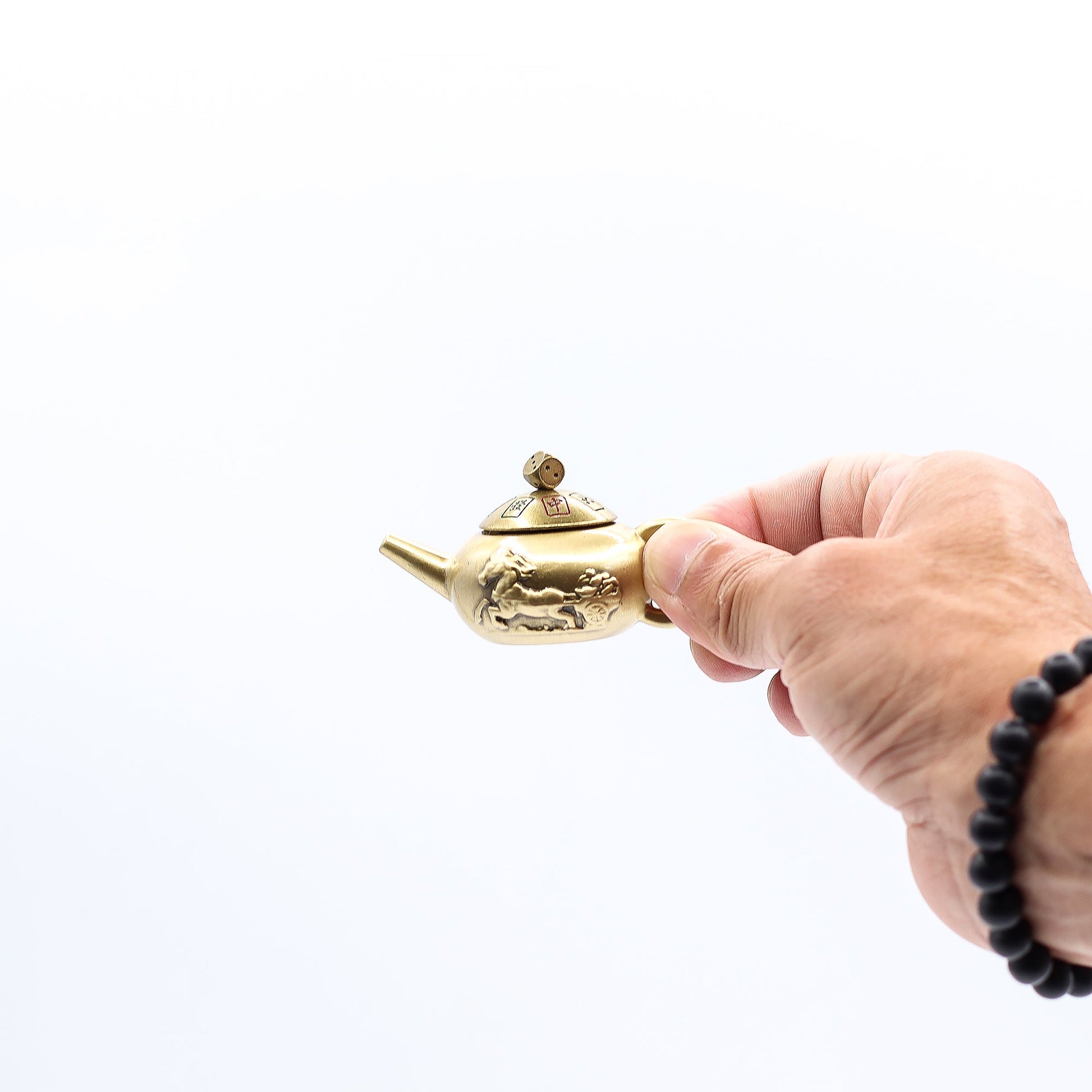 Feng Shui Fortune Spinner - Lucky Teapot with Dice product packaging on clean background from Quintessential Holistic Health Ltd