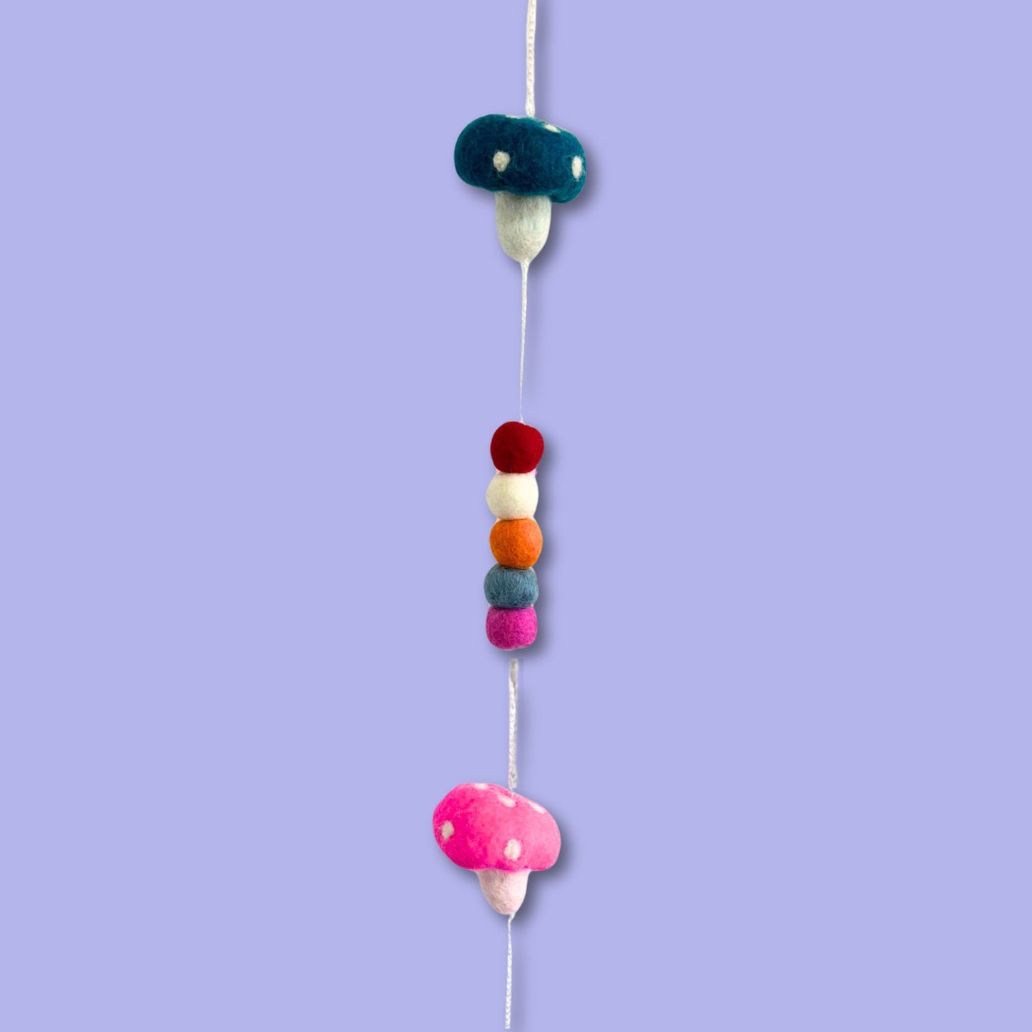 Handmade Childs Nursery Felt Wall or Ceiling Hanging - Mushrooms / Random Colour product packaging on clean background from Quintessential Holistic Health Ltd