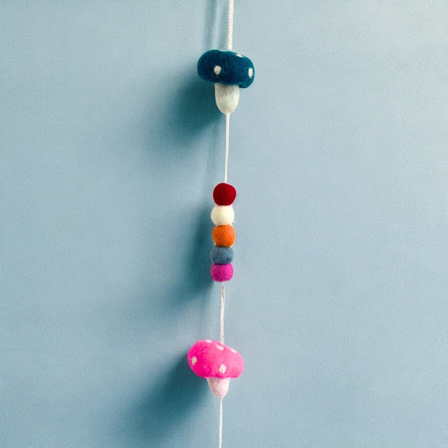 Handmade Childs Nursery Felt Wall or Ceiling Hanging - Mushrooms / Random Colour product packaging on clean background from Quintessential Holistic Health Ltd