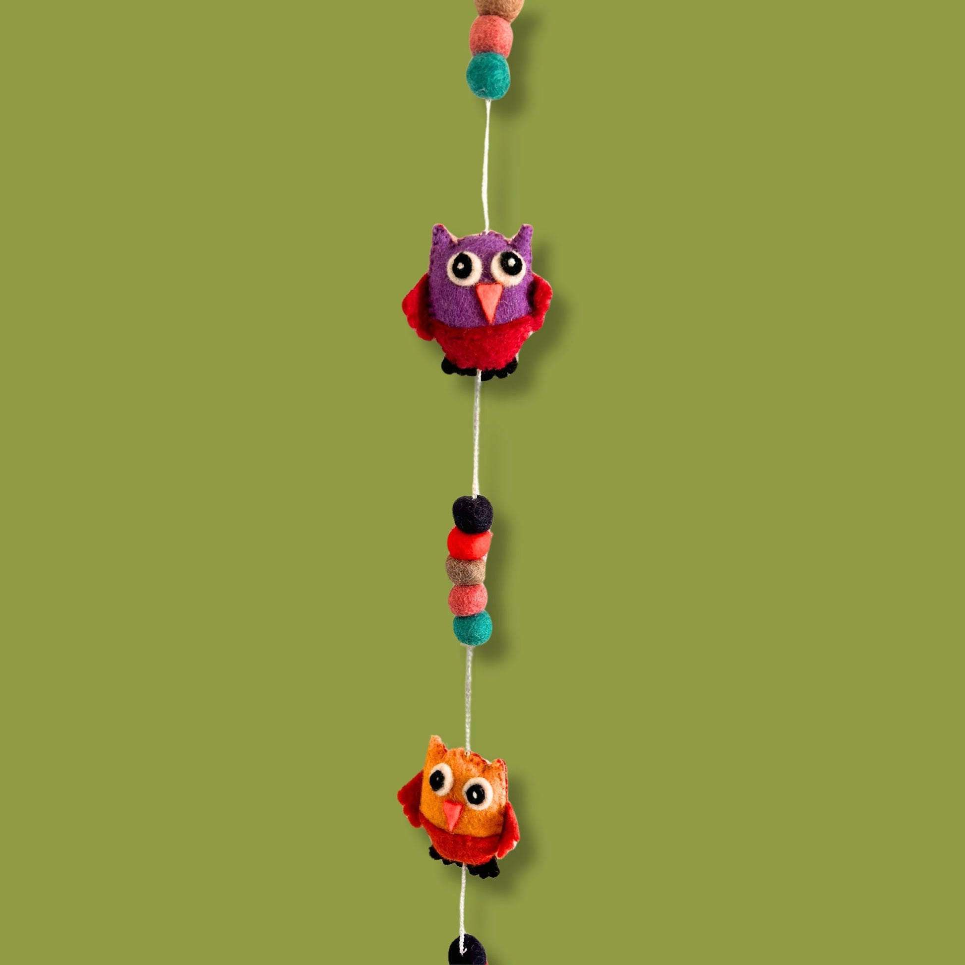 Handmade Childs Nursery Felt Wall or Ceiling Hanging - Owls / Random Colours product packaging on clean background from Quintessential Holistic Health Ltd