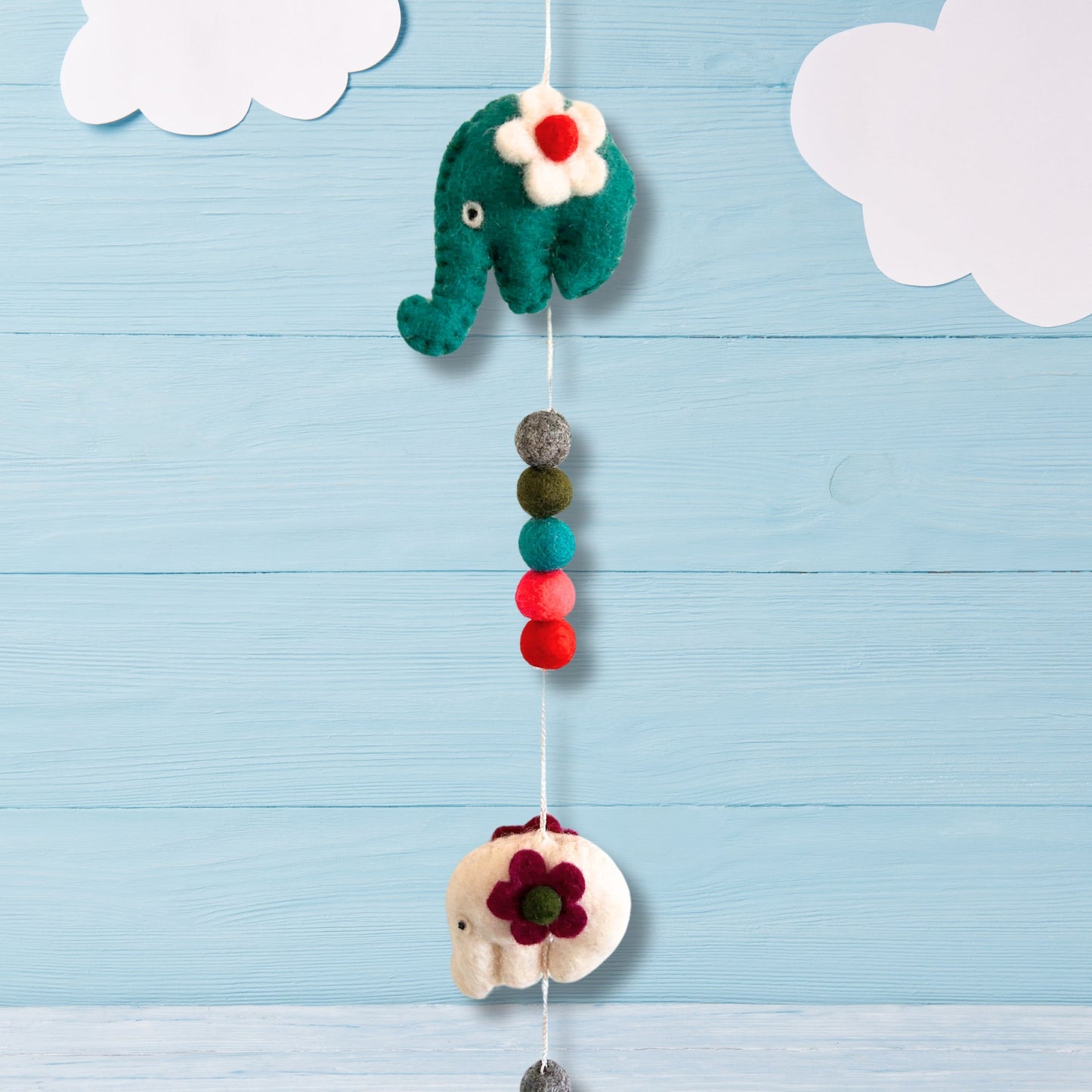 Handmade Childs Nursery Felt Wall or Ceiling Hanging - Elephants / Random Colours product packaging on clean background from Quintessential Holistic Health Ltd