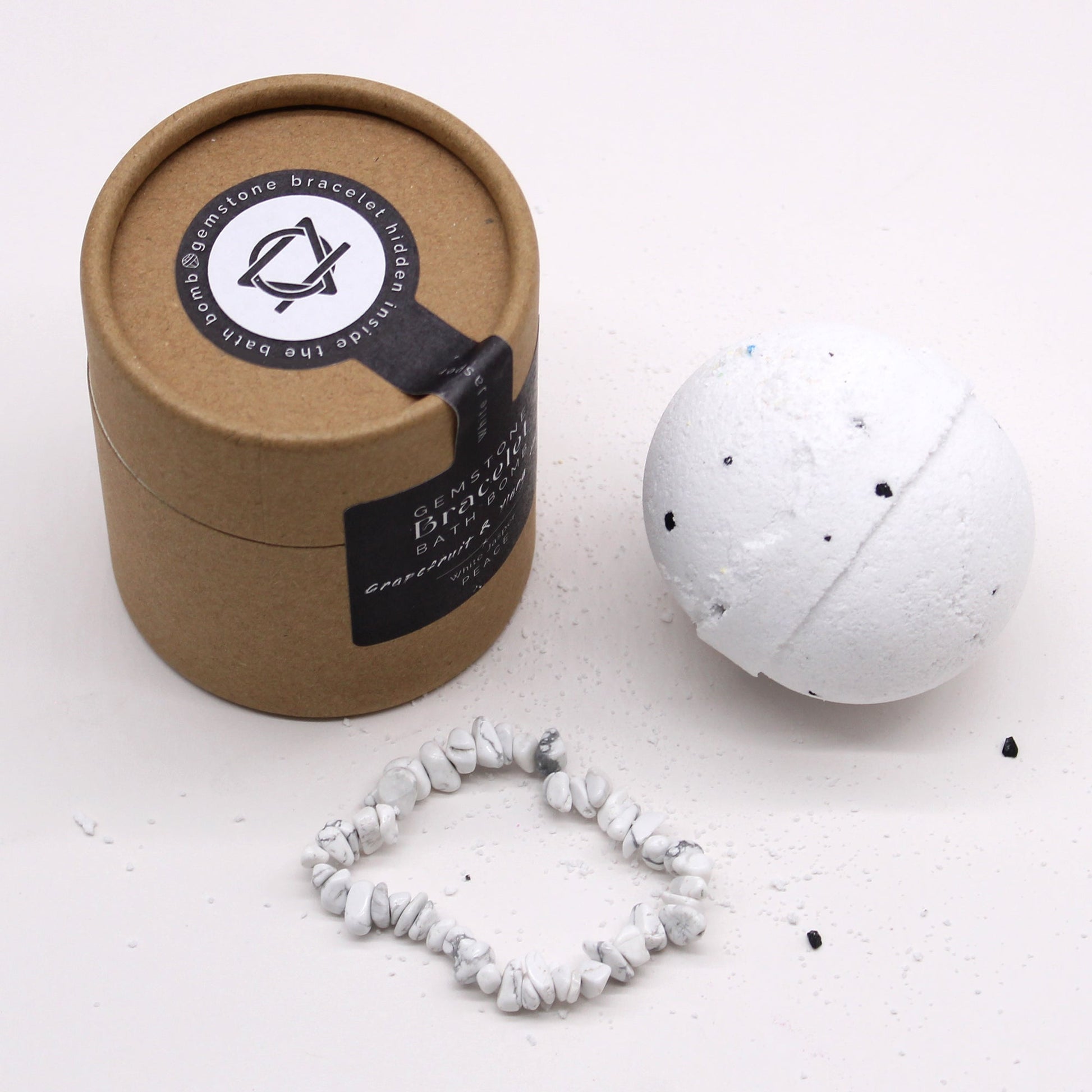 Bracelet Bath Bomb - Grapefruit & Ylang Ylang - White Jasper, white sphere and chip bracelet arranged in front of a brown tube by Quintessential Holistic Health Ltd