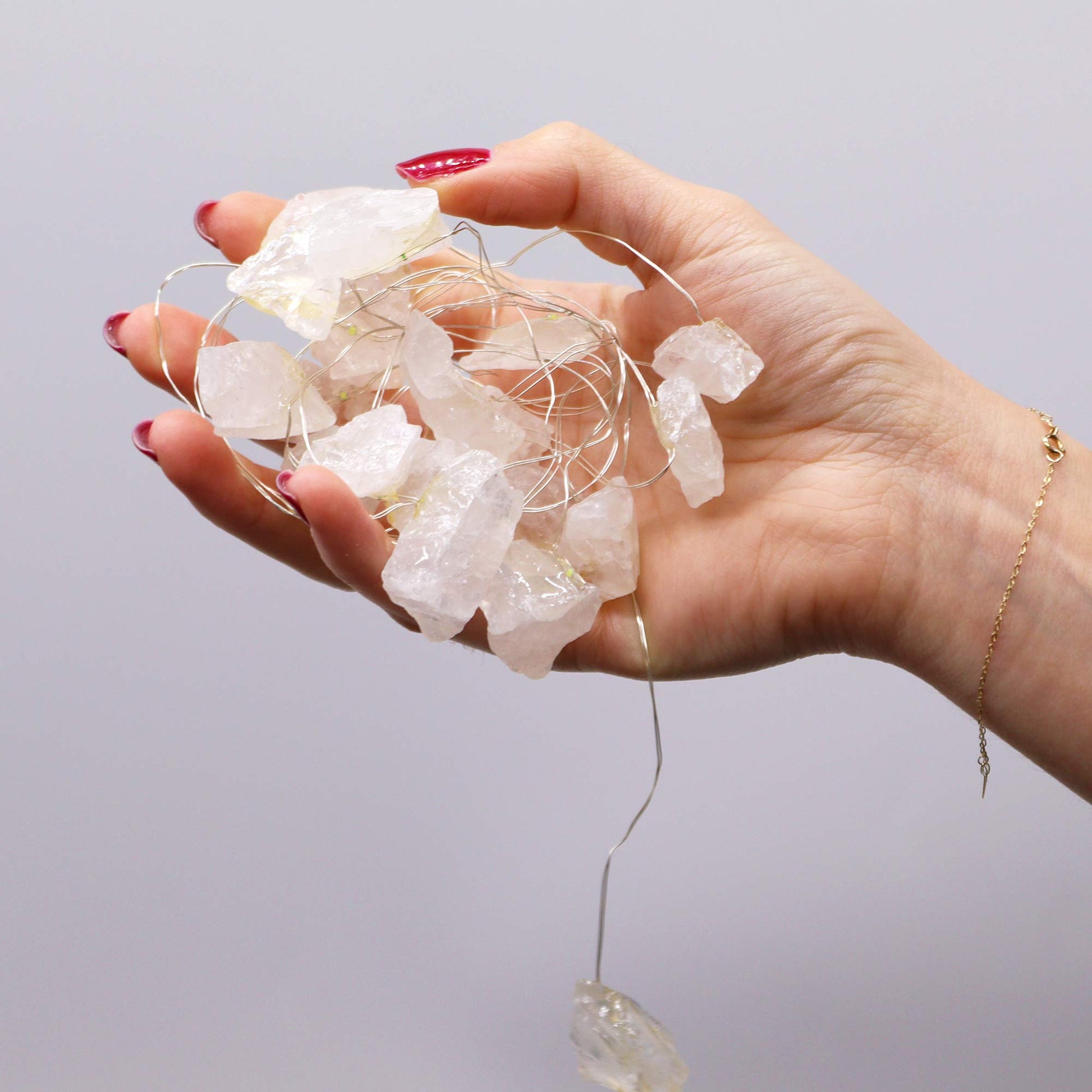 Gemstone Indoor Enchantment Lights - Rock Quartz product packaging on clean background from Quintessential Holistic Health Ltd