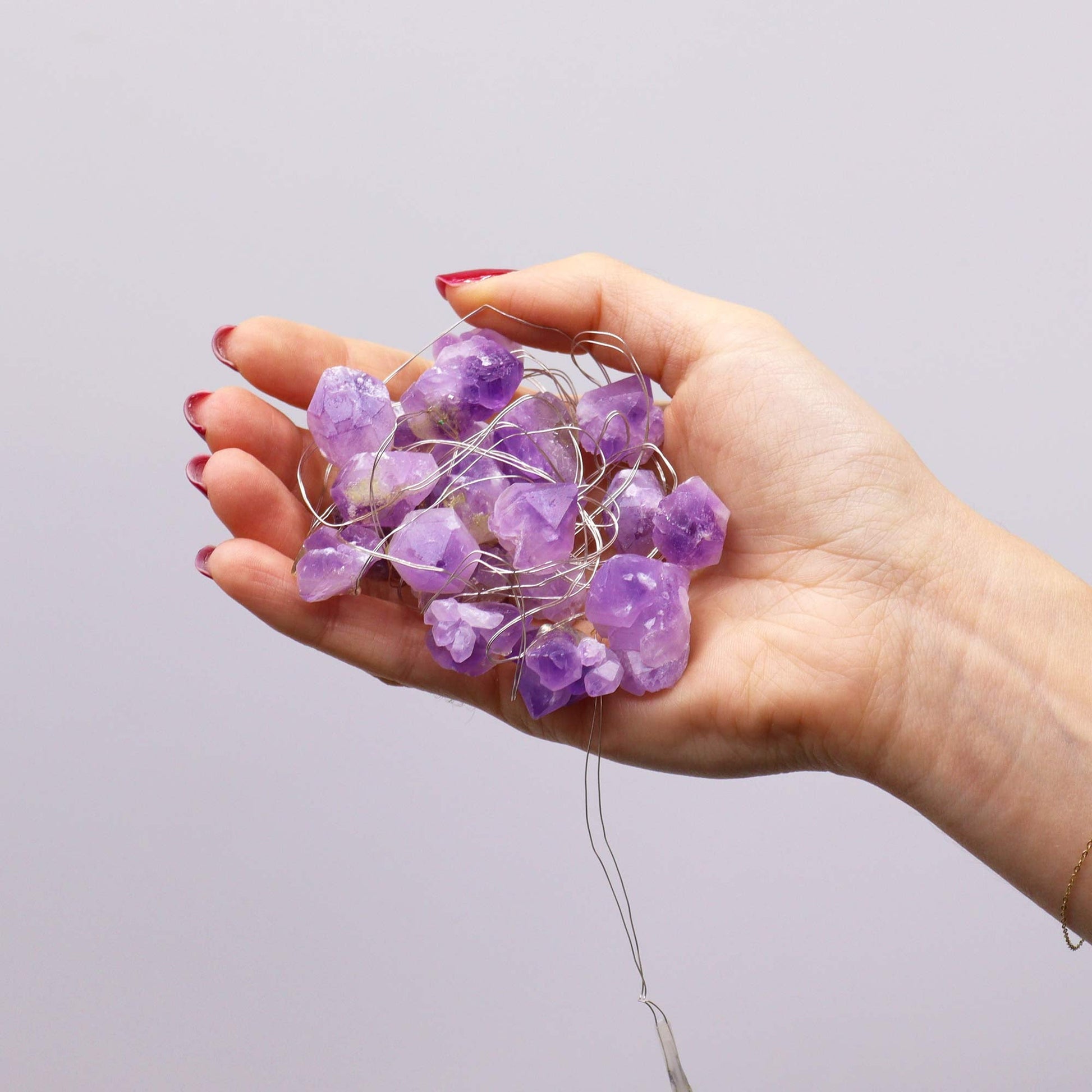 Gemstone Indoor Enchantment Lights - Amethyst product packaging on clean background from Quintessential Holistic Health Ltd
