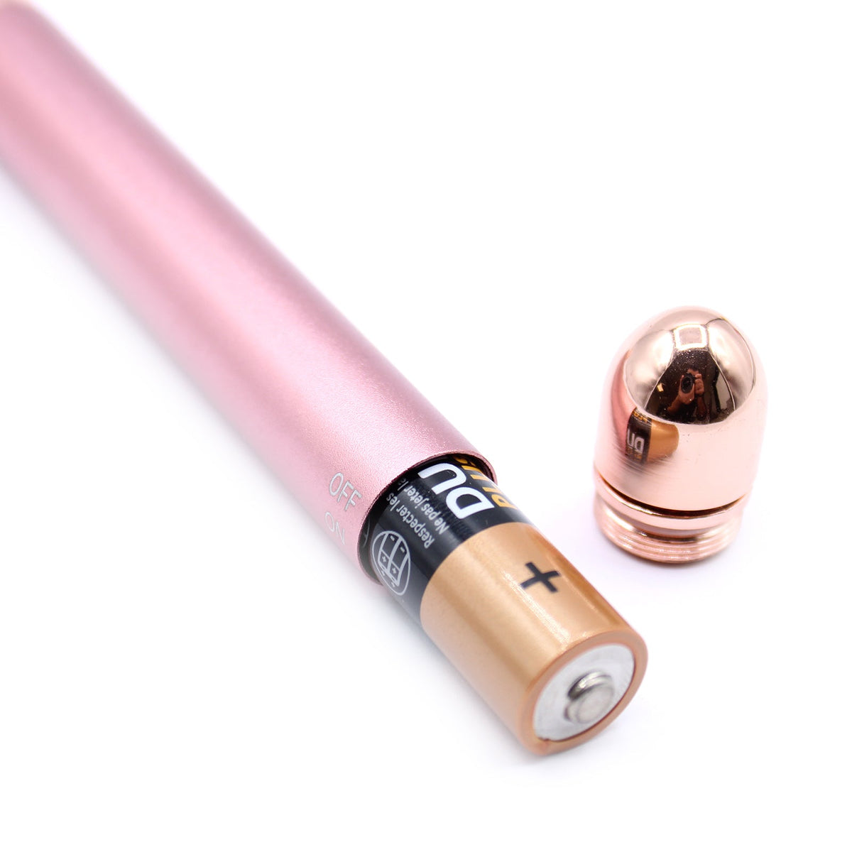 Gemstone Vibration Pad - Rose Quartz, showing the pink handle, control band and detached rounded end cap, by Quintessential Holistic Health Ltd