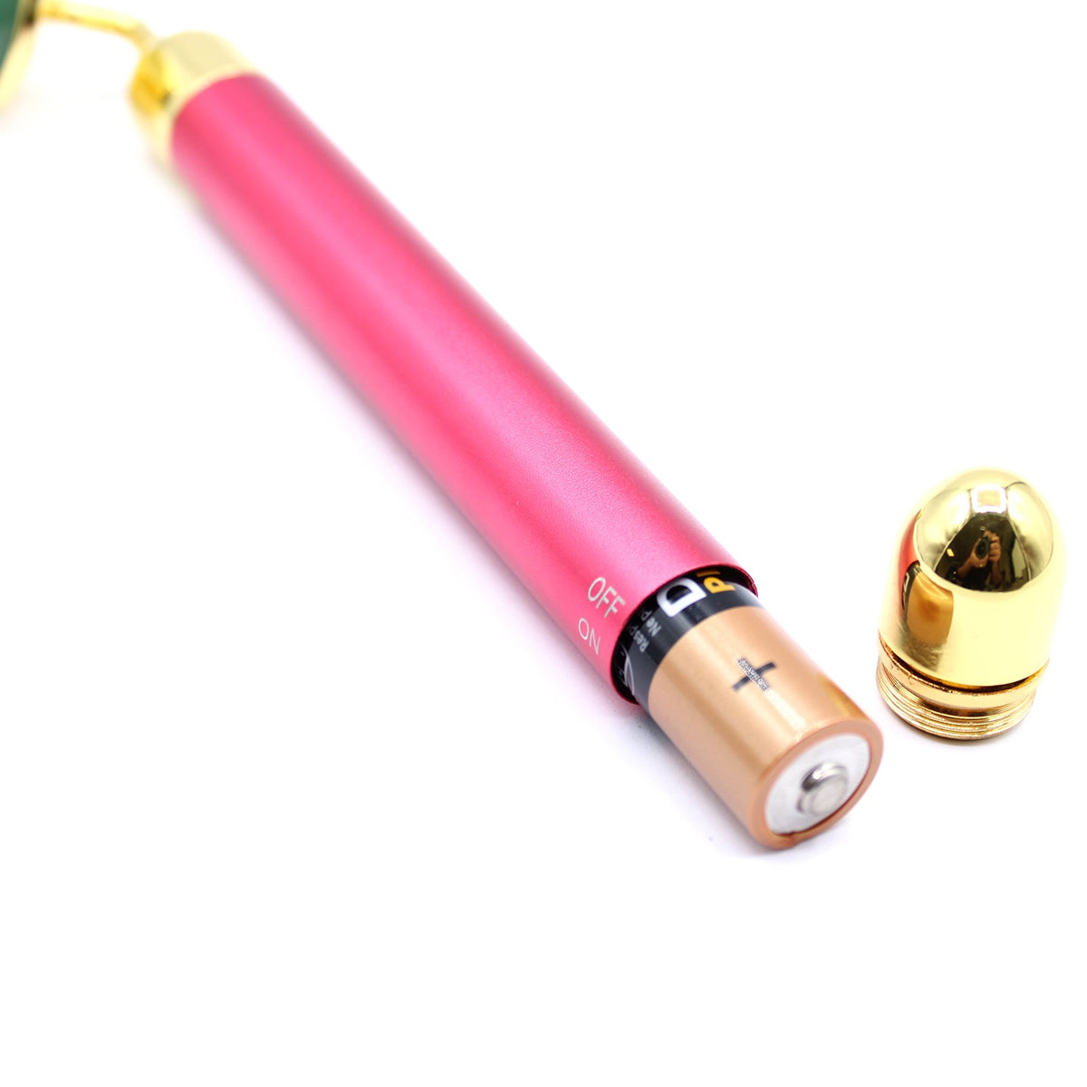 Gemstone Vibration Pad - Jade, with a bright pink handle, green stone roller and detached gold end cap, by Quintessential Holistic Health Ltd