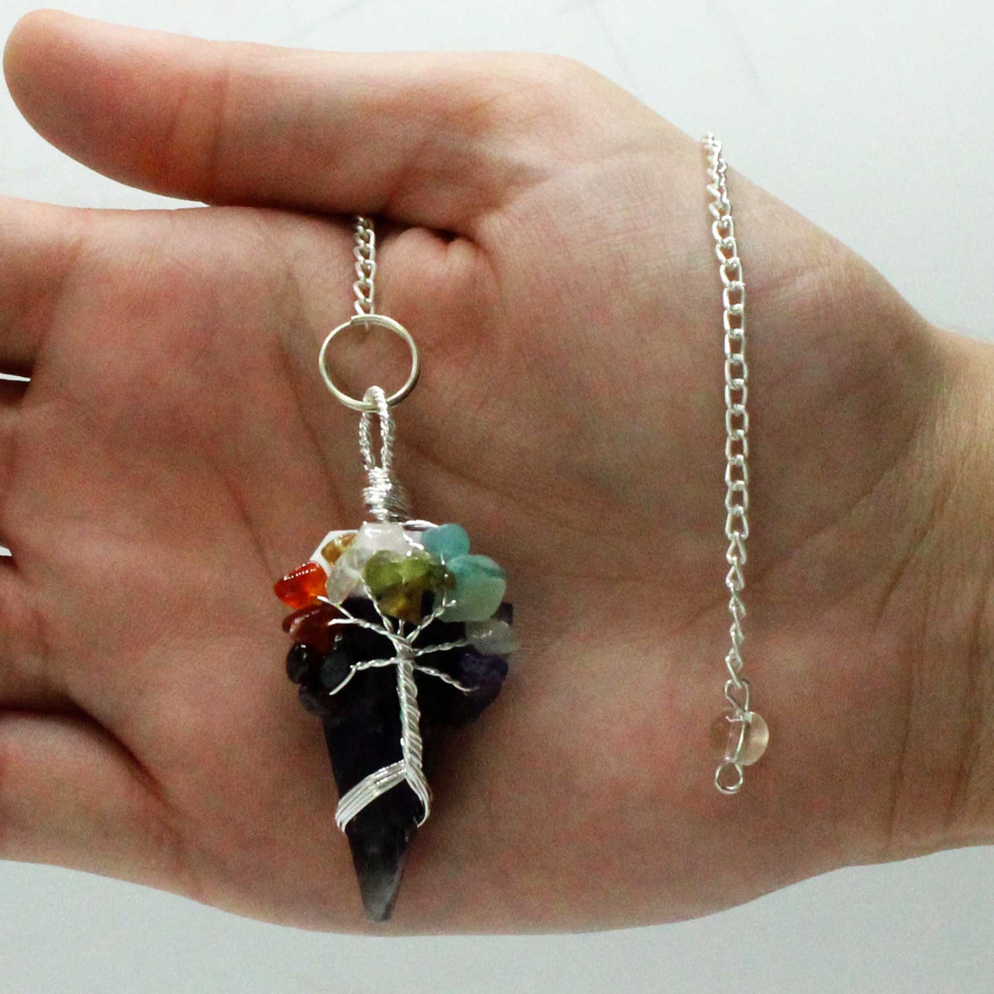1 x Handmade Magic Radiesthesia Pendulum - Seven Chakra - Amethyst Gemstone product packaging on clean background from Quintessential Holistic Health Ltd
