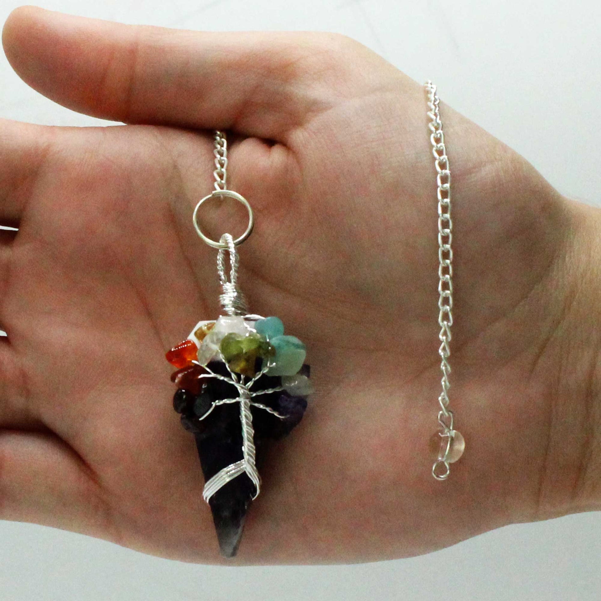 1 x Handmade Magic Radiesthesia Pendulum - Seven Chakra - Amethyst Gemstone product packaging on clean background from Quintessential Holistic Health Ltd