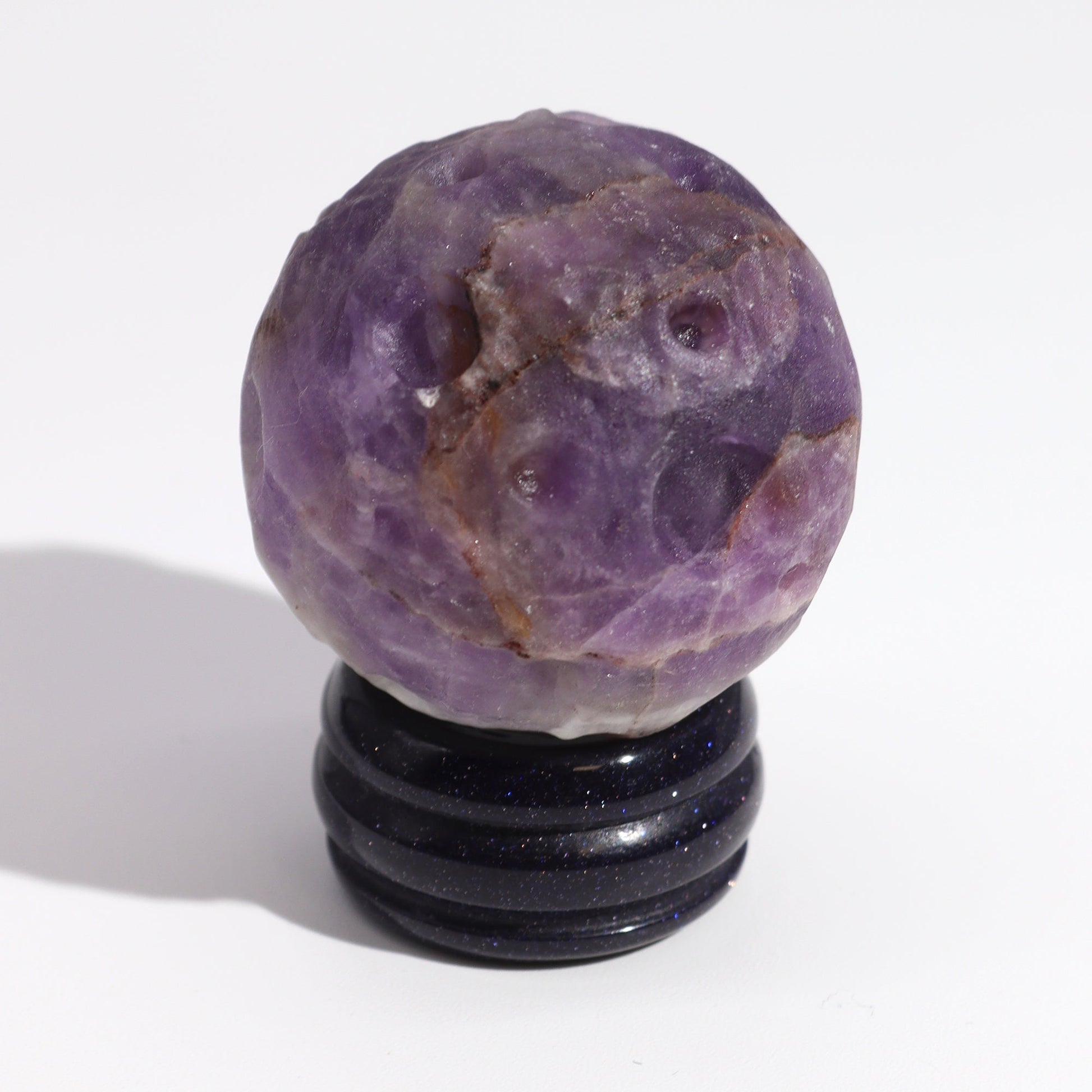 Amethyst Gemstone Planet and Goldstone Stand - Jupiter product packaging on clean background from Quintessential Holistic Health Ltd