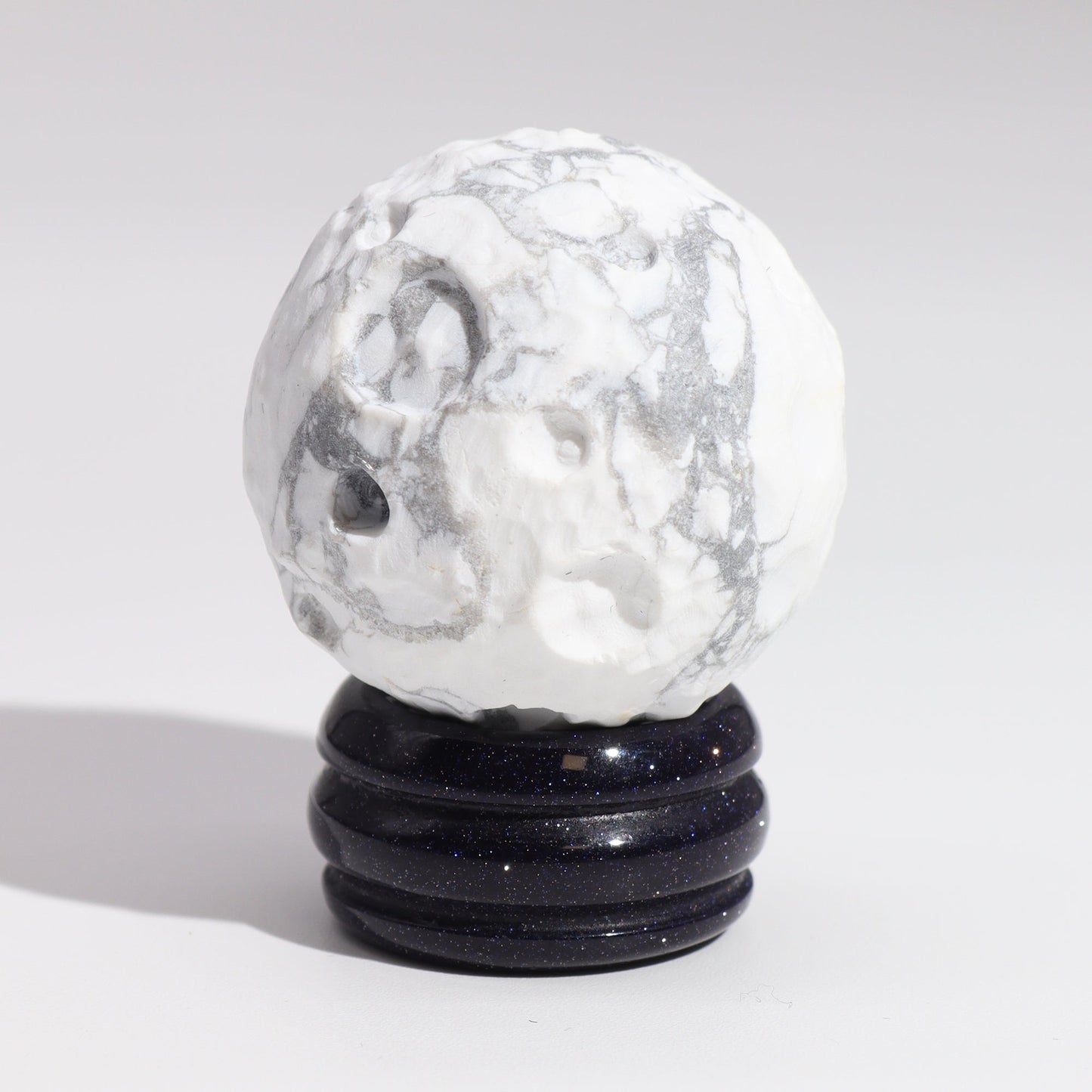 White Howlite Gemstone Planet and Goldstone Stand - Moon product packaging on clean background from Quintessential Holistic Health Ltd