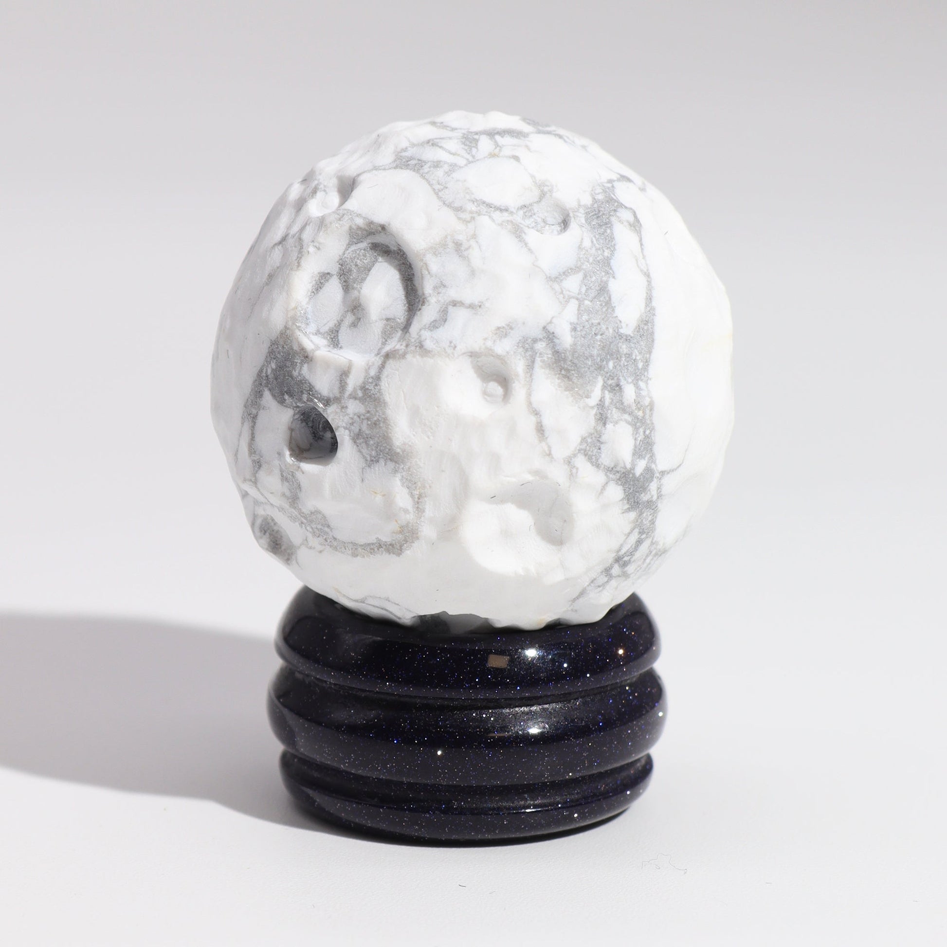 White Howlite Gemstone Planet and Goldstone Stand - Moon product packaging on clean background from Quintessential Holistic Health Ltd