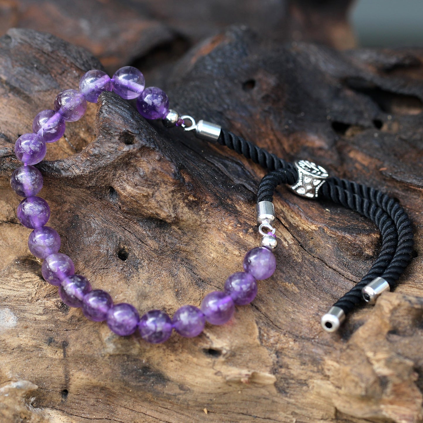 Unisex Handcrafted 925 Silver Plated Gemstone Bracelet - Black String / Amethyst product packaging on clean background from Quintessential Holistic Health Ltd