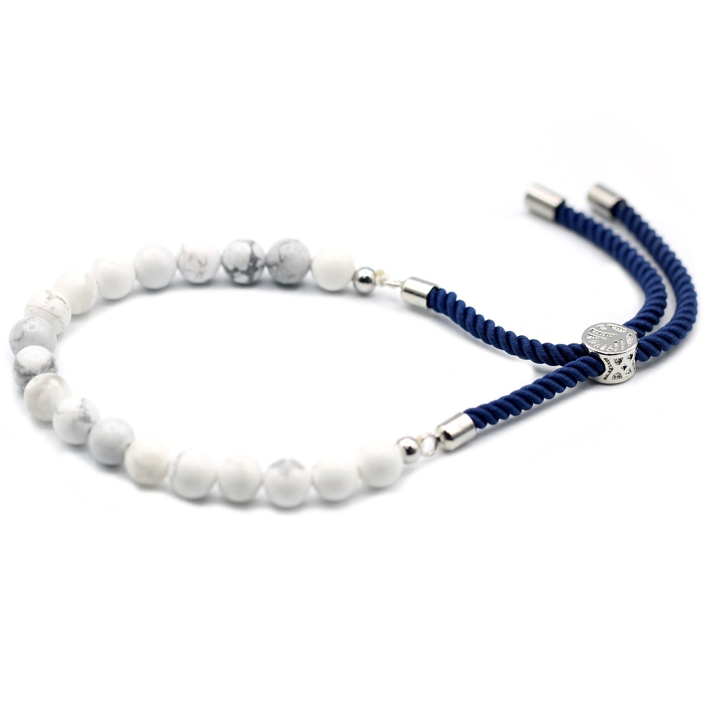 Unisex Handcrafted 925 Silver Plated Gemstone Bracelet - Navy Blue String / White Howlite product packaging on clean background from Quintessential Holistic Health Ltd