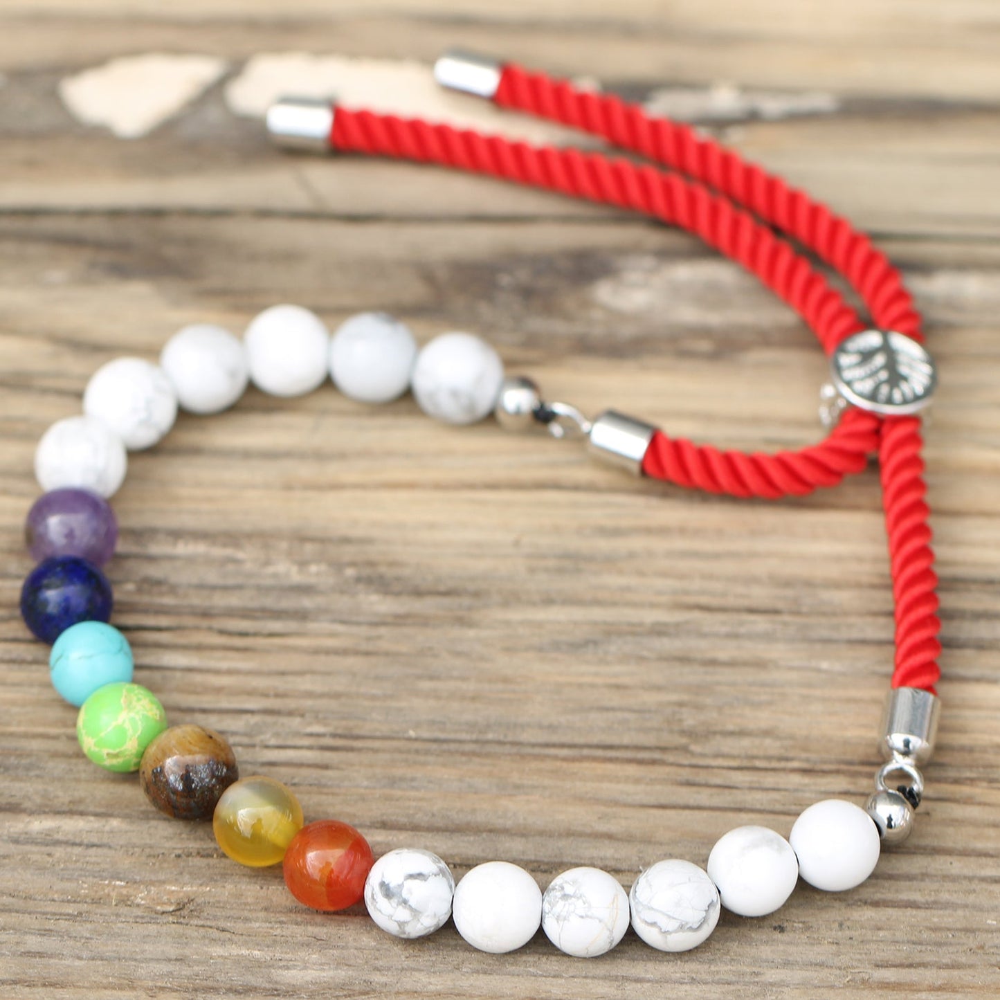 Unisex Handcrafted 925 Silver Plated Gemstone Bracelet - Royal Red String / White Howlite Chakra product packaging on clean background from Quintessential Holistic Health Ltd