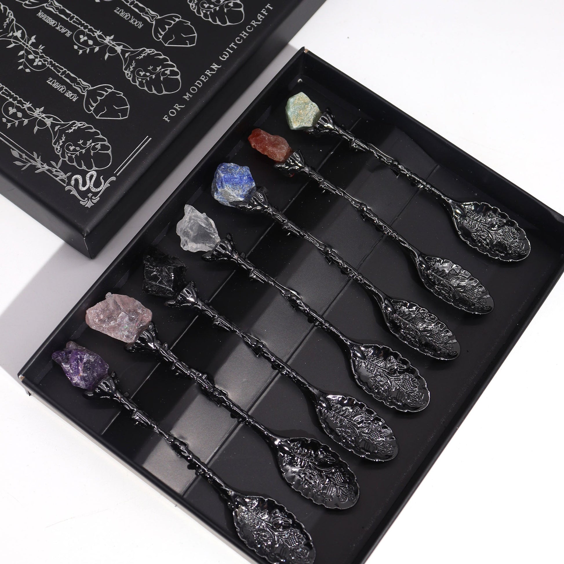 Set of 7 Gemstone Crystal Witches Spoons - Dark Silver product packaging on clean background from Quintessential Holistic Health Ltd