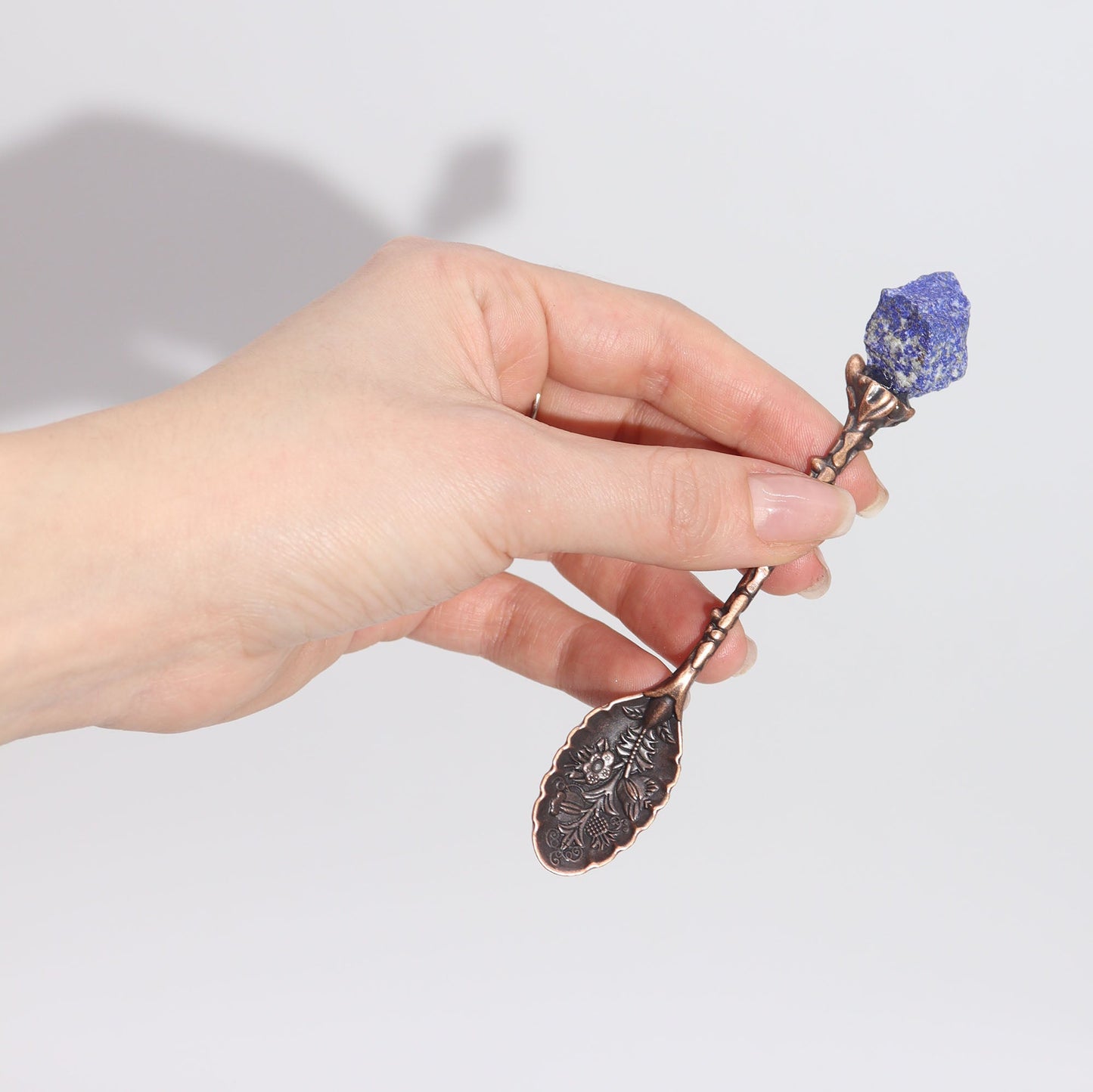Set of 7 Gemstone Crystal Witches Spoons - Bronze product packaging on clean background from Quintessential Holistic Health Ltd