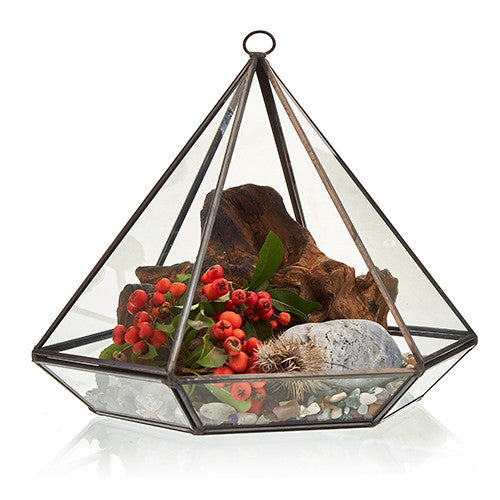 Large Glass and Brass Diamond Terrarium, faceted display filled with red berries, wood pieces, stones and foliage, by Quintessential Holistic Health Ltd