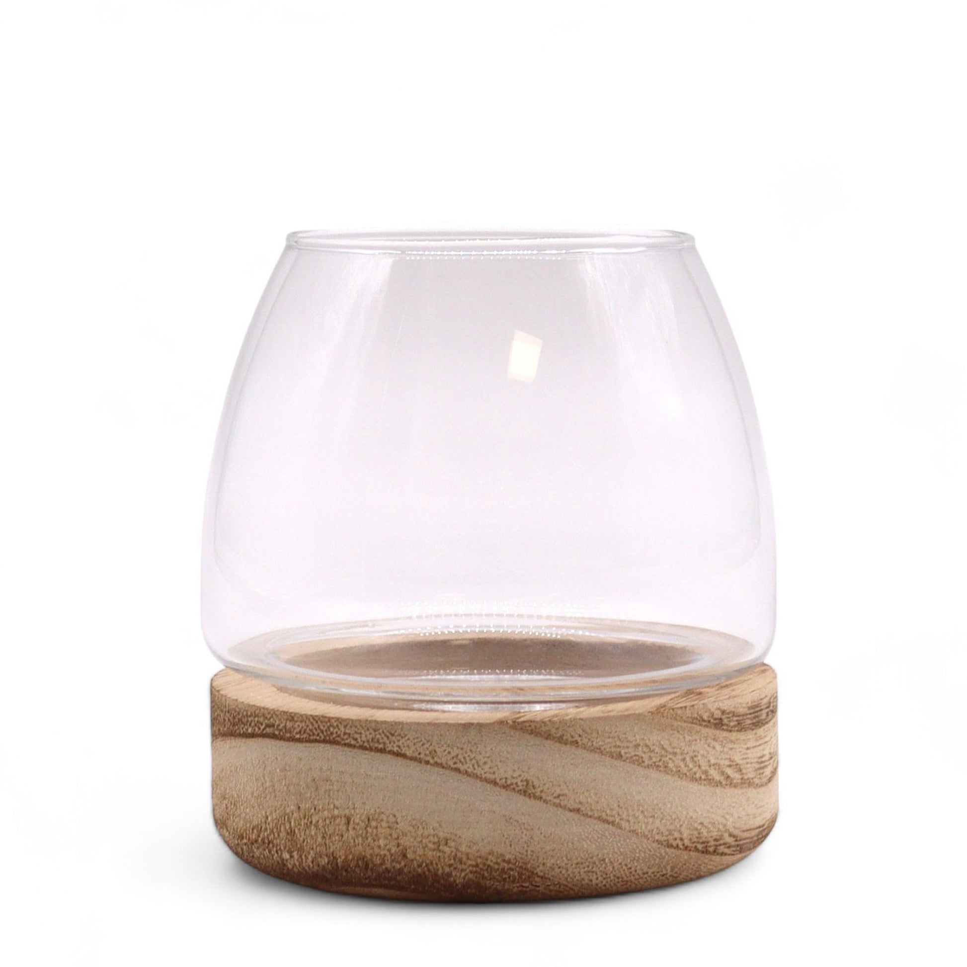 Glass Terrarium on Tung Wood - Mini - Natural, front view of a clear rounded glass vessel on a pale carved wooden base by Quintessential Holistic Health Ltd