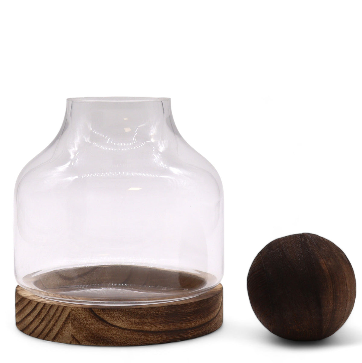 Glass Terrarium on Tung Wood with Ball - Medium - Dark, clear rounded vessel on a dark striped base with the wooden ball beside it by Quintessential Holistic Health Ltd