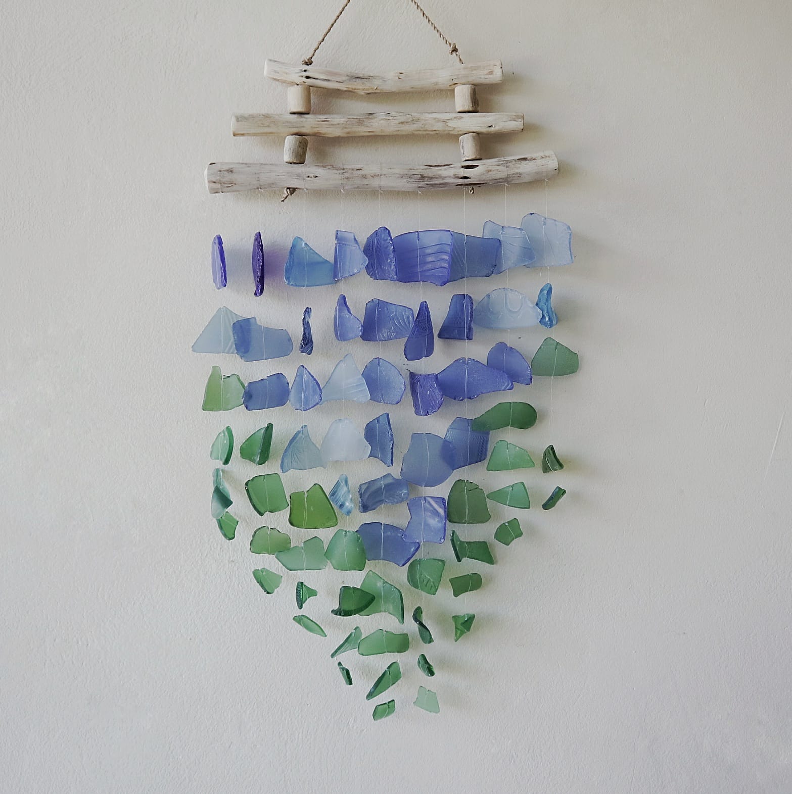 Handmade Driftwood and Recycled Glass Wind Chime - Three Stick / Blue and Green product packaging on clean background from Quintessential Holistic Health Ltd