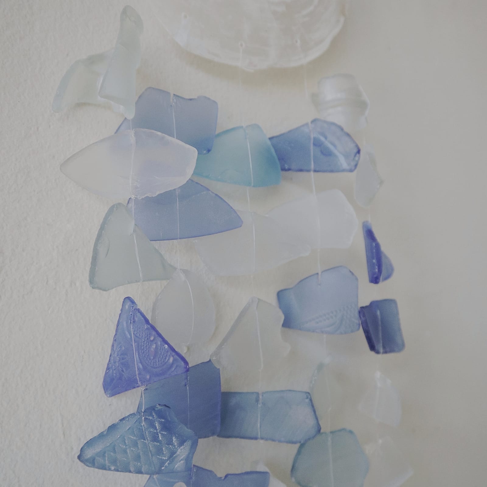 Recycled Glass Wind Chime - Blue & White Glass Drop with overlapping pale blue, dark blue and white hanging pieces by Quintessential Holistic Health Ltd