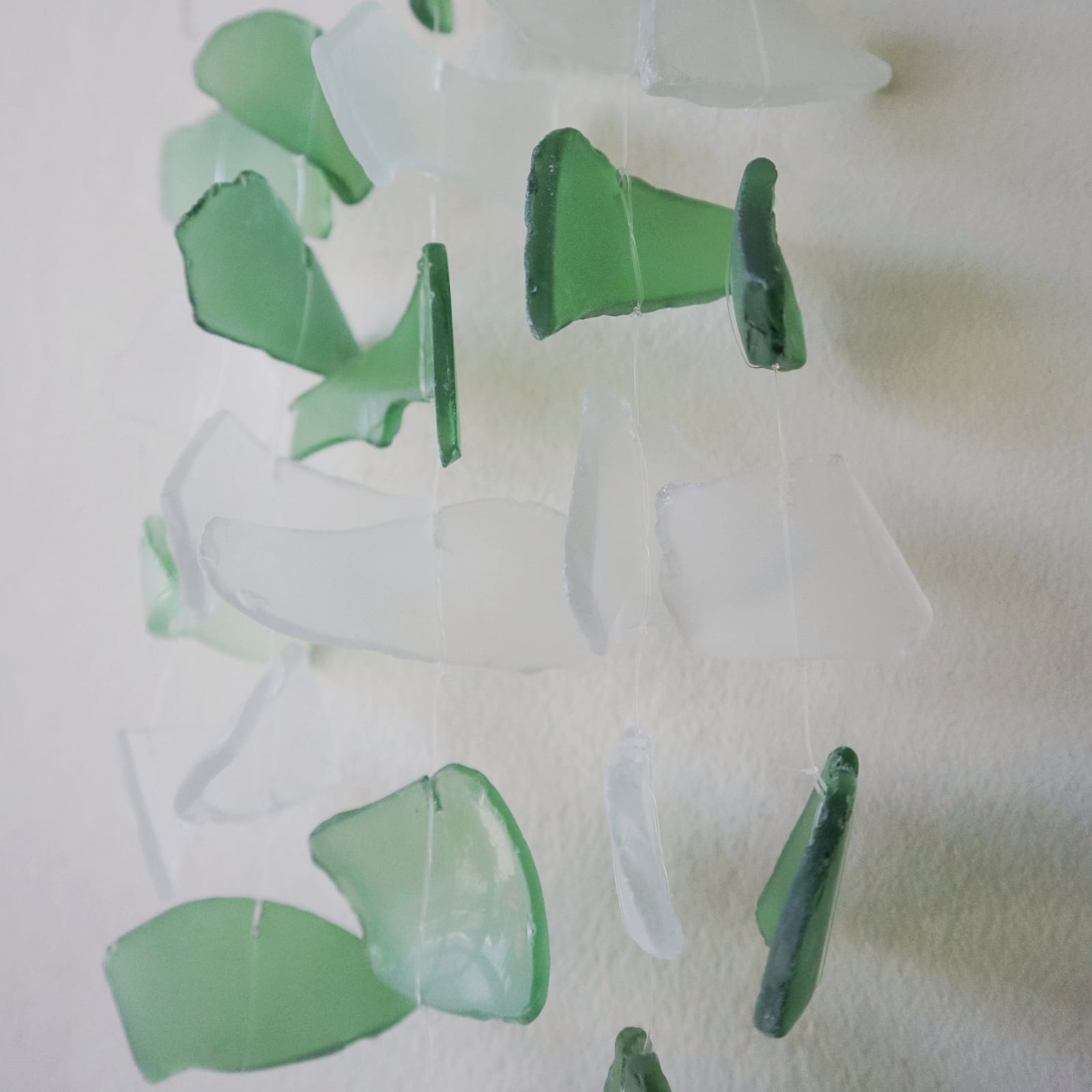 Handmade Recycled Glass Wind Chime - Glass Drop / Green and White product packaging on clean background from Quintessential Holistic Health Ltd