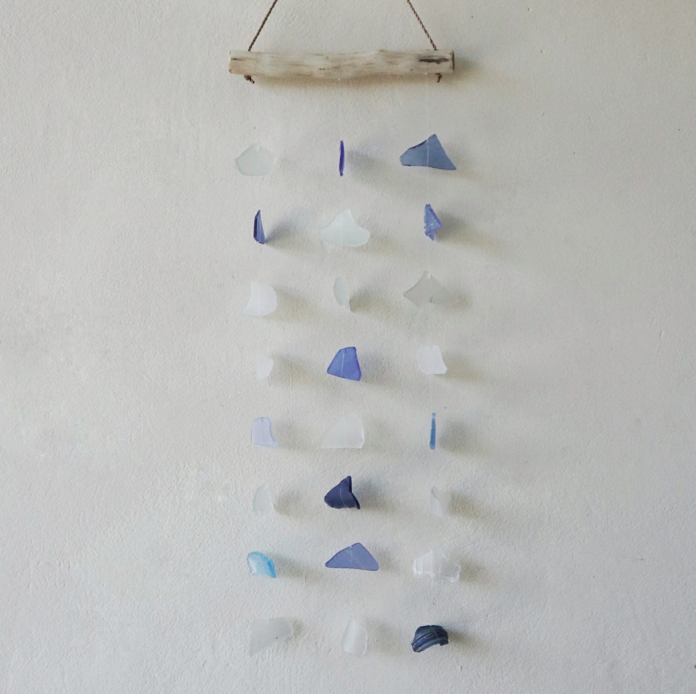 Handmade Driftwood and Recycled Glass Wind Chime - Three Drop / Blue and White product packaging on clean background from Quintessential Holistic Health Ltd