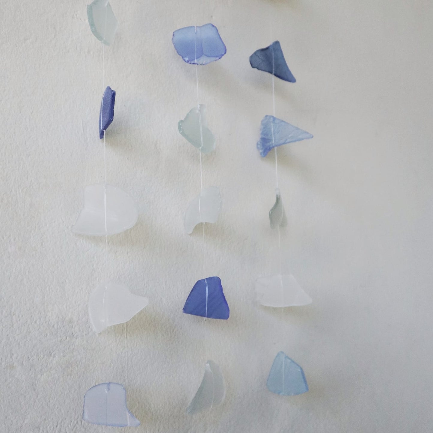 Handmade Driftwood and Recycled Glass Wind Chime - Three Drop / Blue and White product packaging on clean background from Quintessential Holistic Health Ltd