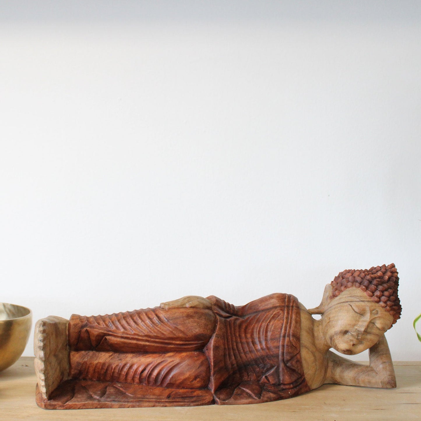 Hand Carved Suar Wooden Sleeping Buddha - 50cm product packaging on clean background from Quintessential Holistic Health Ltd