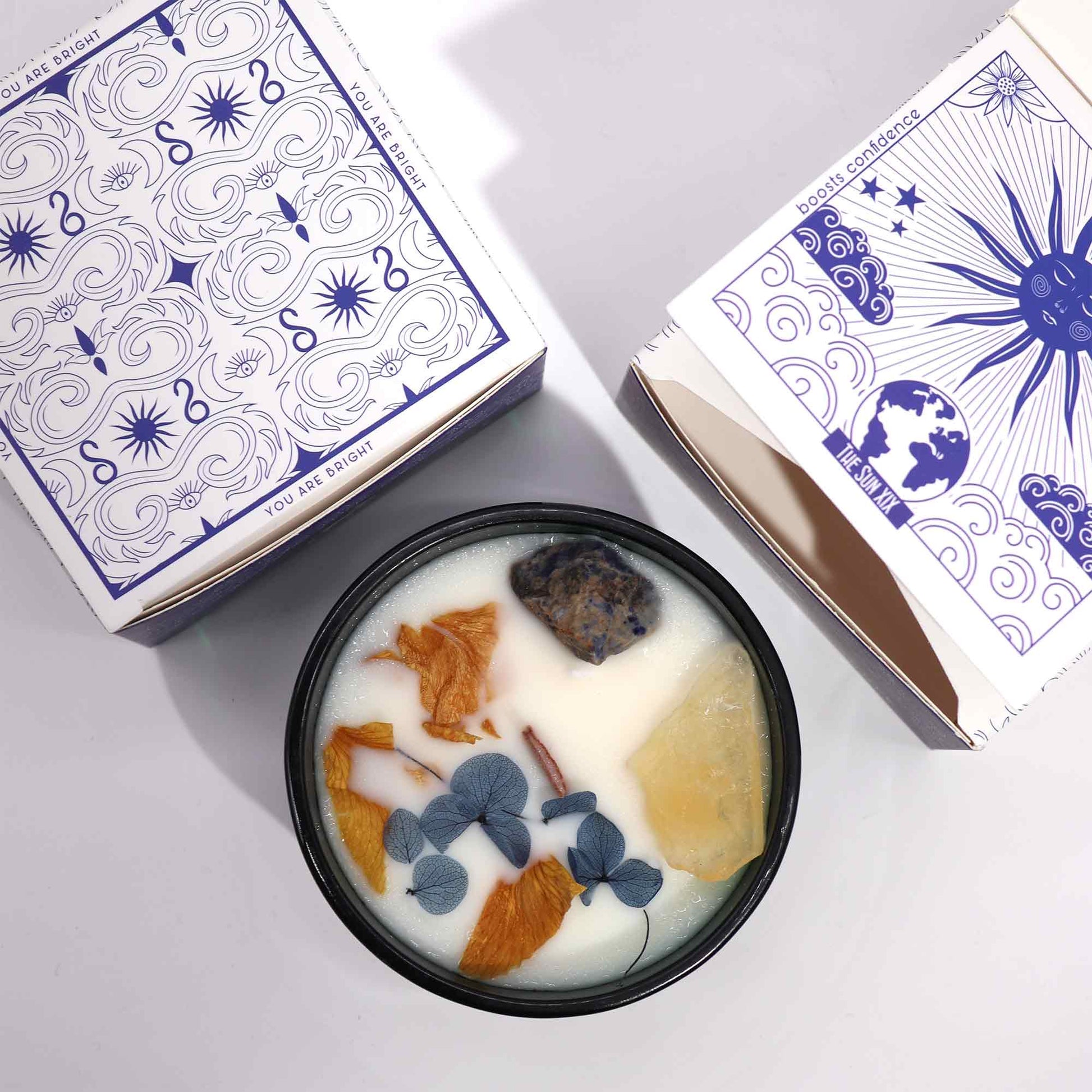 Crystal Magic Flower Eco-Friendly Soy Wax Candle - The Sun product packaging on clean background from Quintessential Holistic Health Ltd