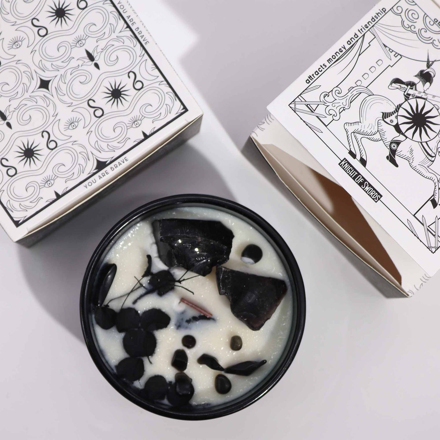 Crystal Magic Flower Eco-Friendly Soy Wax Candle - The Knight of Swords product packaging on clean background from Quintessential Holistic Health Ltd