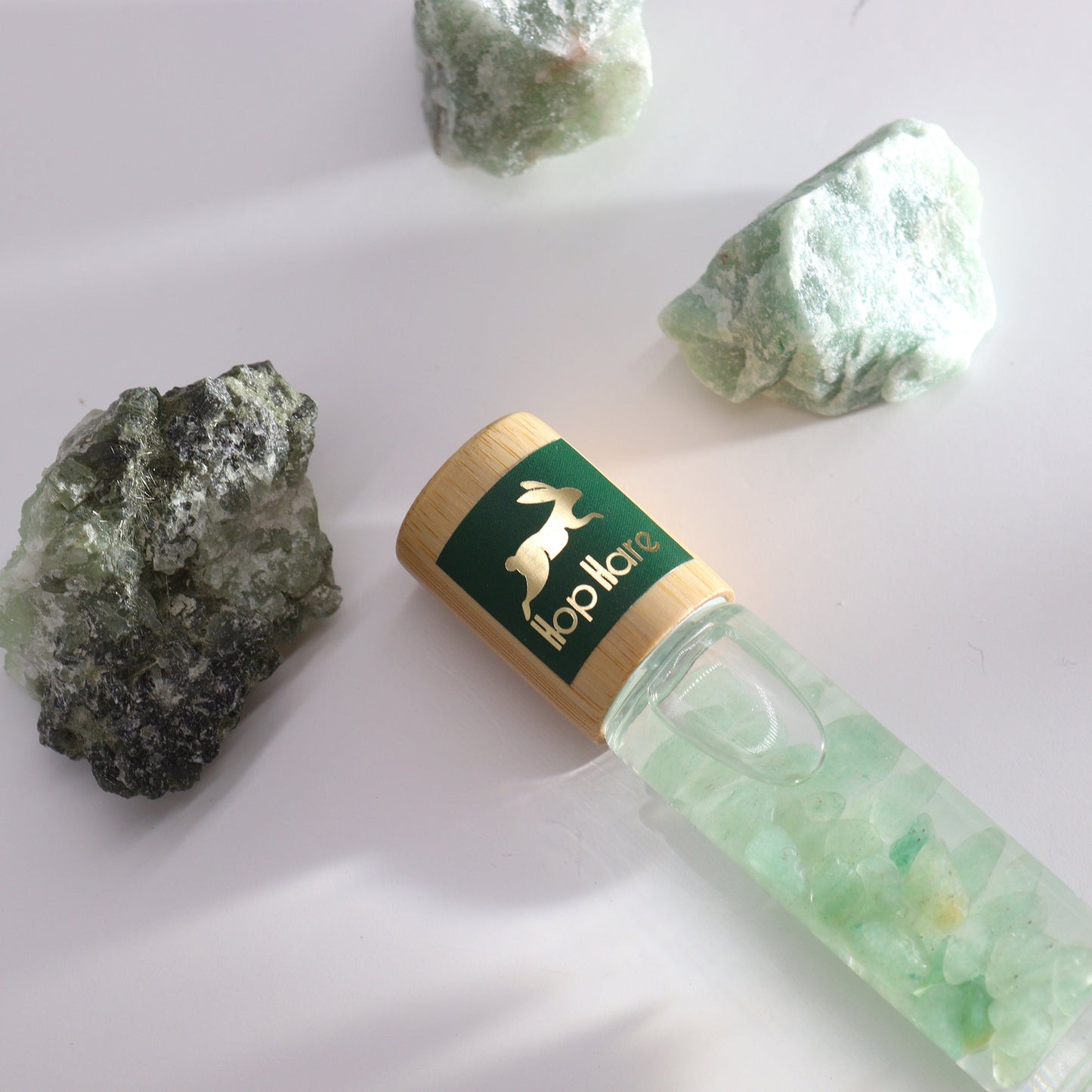 Gemstone Tarot Essential Oil Roll On - Green Aventurine / The Magician product packaging on clean background from Quintessential Holistic Health Ltd